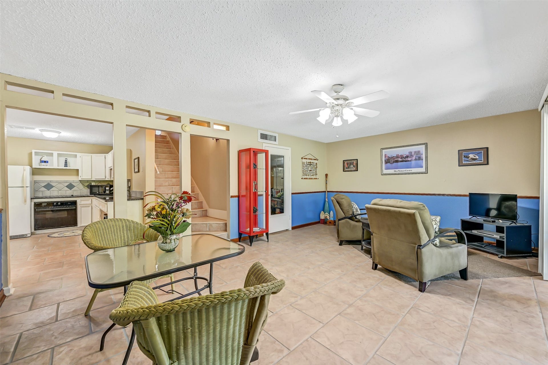 18214 Bal Harbour Drive, Nassau Bay, TX 77058 The spacious ground-floor living/game room provides a second gathering area with durable tile flooring, a ceiling fan & plenty of room for seating, dining or recreation. A guest kitchen is conveniently located nearby, while a mini-split system provides cooling/heating for this entire level. An additional flex room offers possibilities as a fourth bedroom, workout room, hobby space or home office.