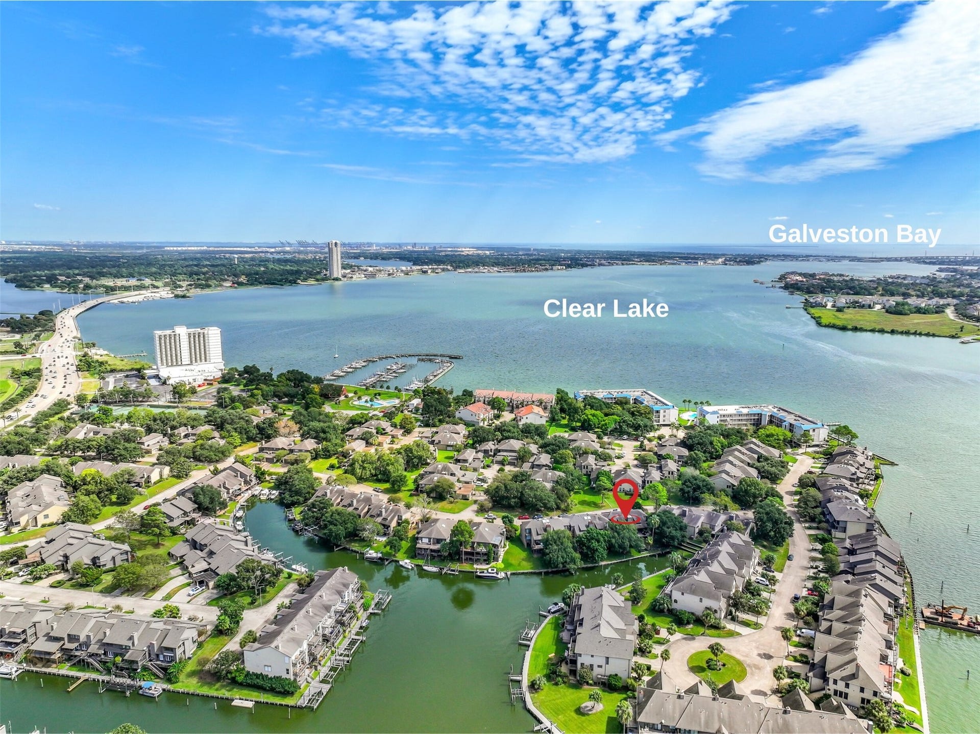 18214 Bal Harbour Drive, Nassau Bay, TX 77058 From your own home, explore the connected waterways of Clear Lake, Nassau Bay & Galveston Bay, with access to the Gulf and beyond! This aerial captures the remarkable setting of 18214 Bal Harbour, where protected canals, open deep water & a vibrant boating community come together just outside your back door.