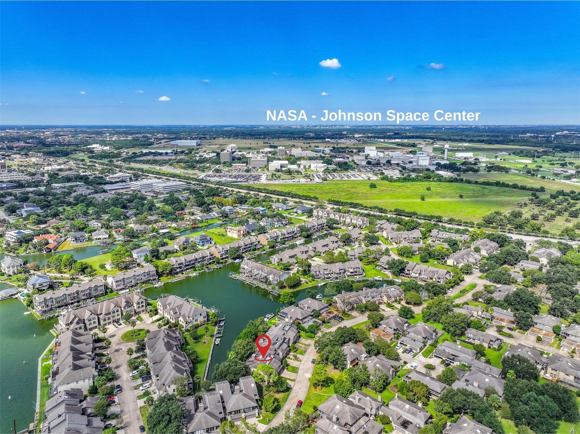 18214 Bal Harbour Drive, Nassau Bay, TX 77058 Just across NASA Parkway from Bal Harbour is NASA's Johnson Space Center, home to Mission Control and astronaut training! This aerial highlights the community's remarkable proximity to the NASA campus, making Nassau Bay a longtime favorite among aerospace professionals and those who appreciate its rich space exploration history.