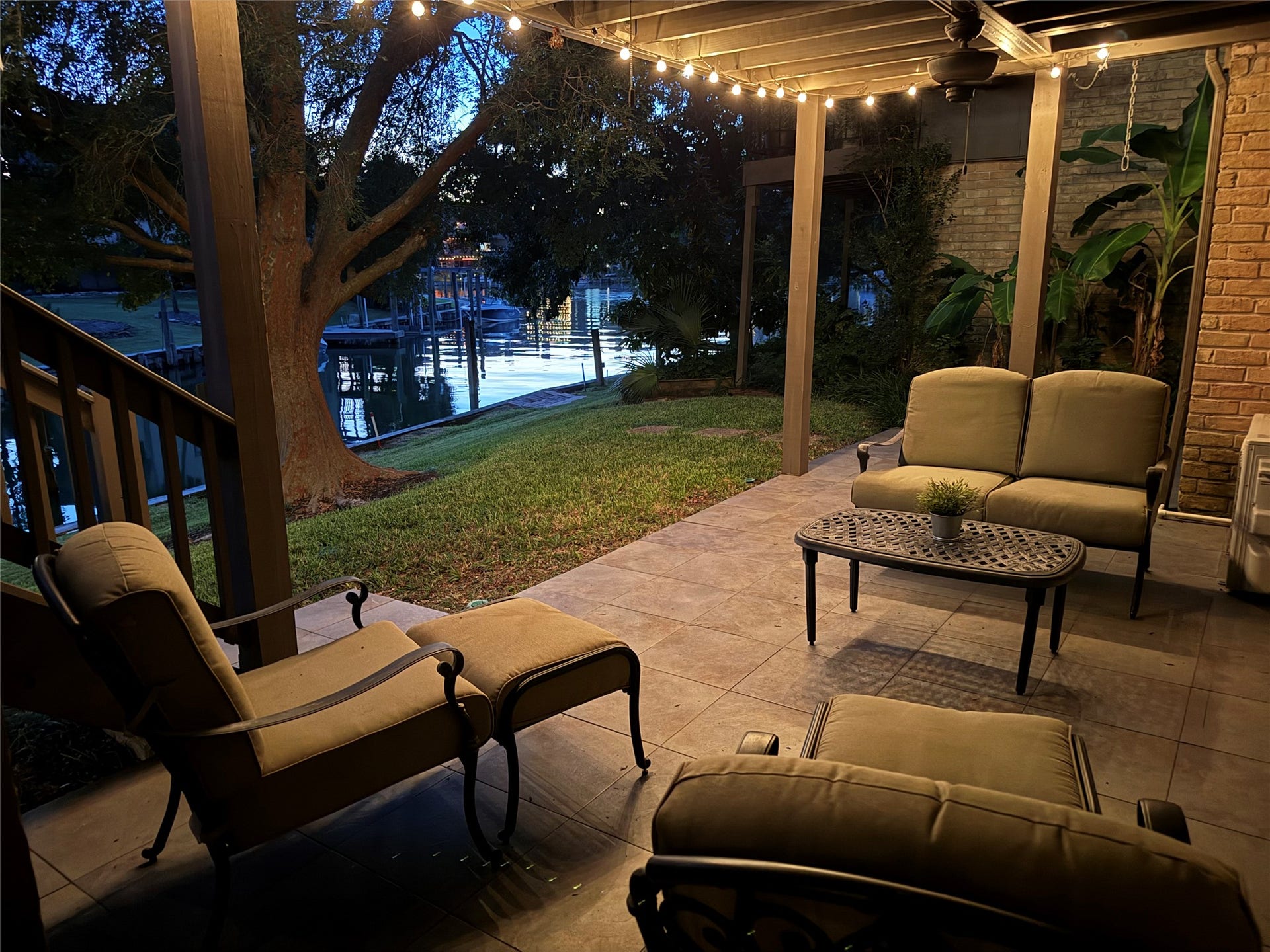 18214 Bal Harbour Drive, Nassau Bay, TX 77058 The patio is great for entertaining family or friends, or just enjoying a quiet evening as light from the setting sun reflects off the canal. Surrounded by the waterfront setting, with the canal just steps away, this inviting retreat is a perfect place to unwind and enjoy the coastal lifestyle.