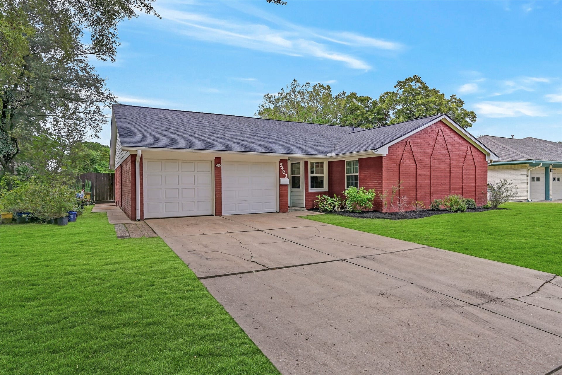 5403 Carmona Lane, Pearland, TX 77584 Welcome to 5403 Carmona Lane! Set in established Corrigan with no HOA, this updated one-story Pearland home offers 4 bedrooms, 2 full baths, a flexible office/dining room, 2-car garage & double-wide driveway. A freshly mulched landscape, painted brick exterior & approx. 1-year-old roof complete the view.