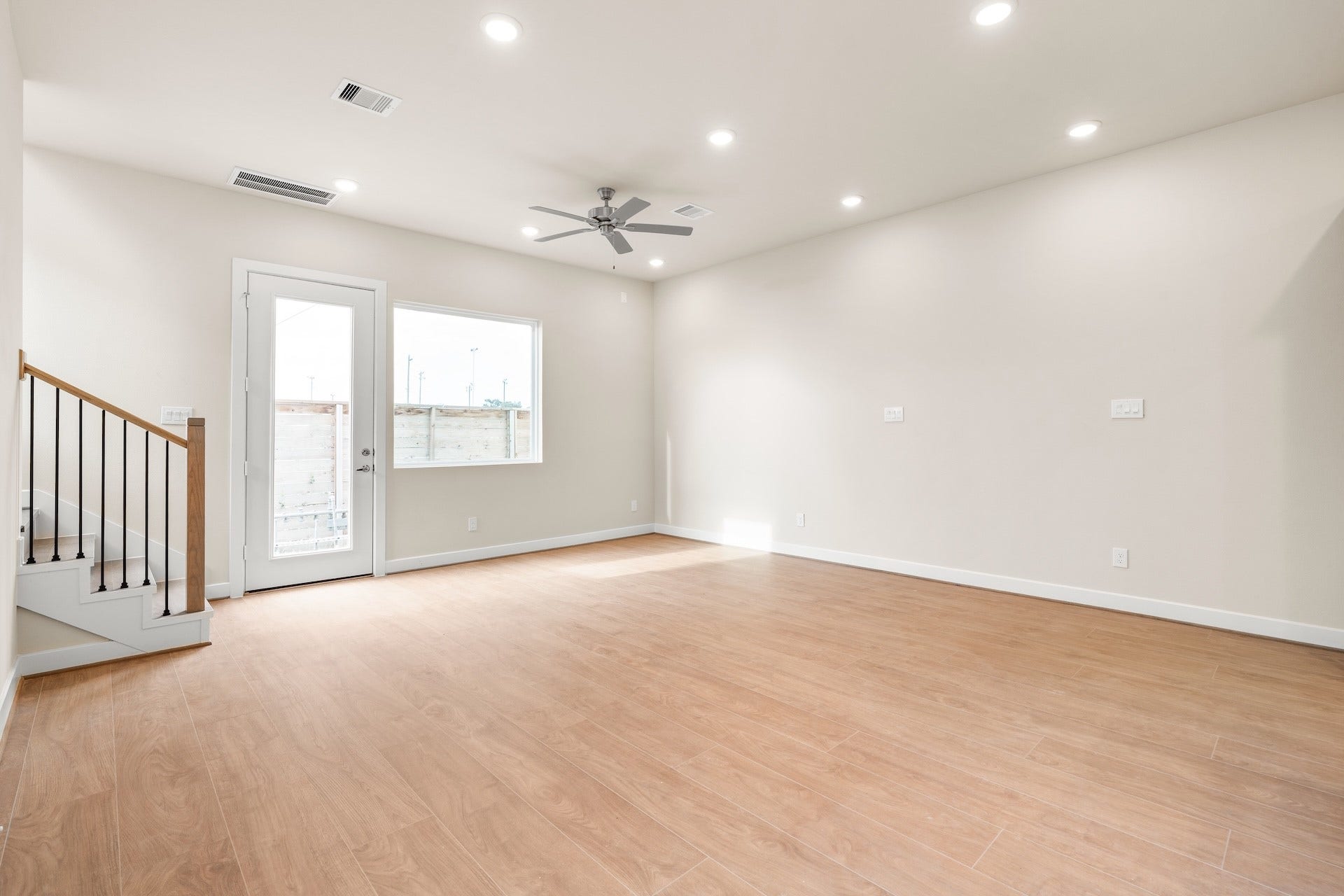 6551-6553 Rena Street, Houston, TX 77092 Living Room Previous work by the builder in the community, not representation of exact unit listed