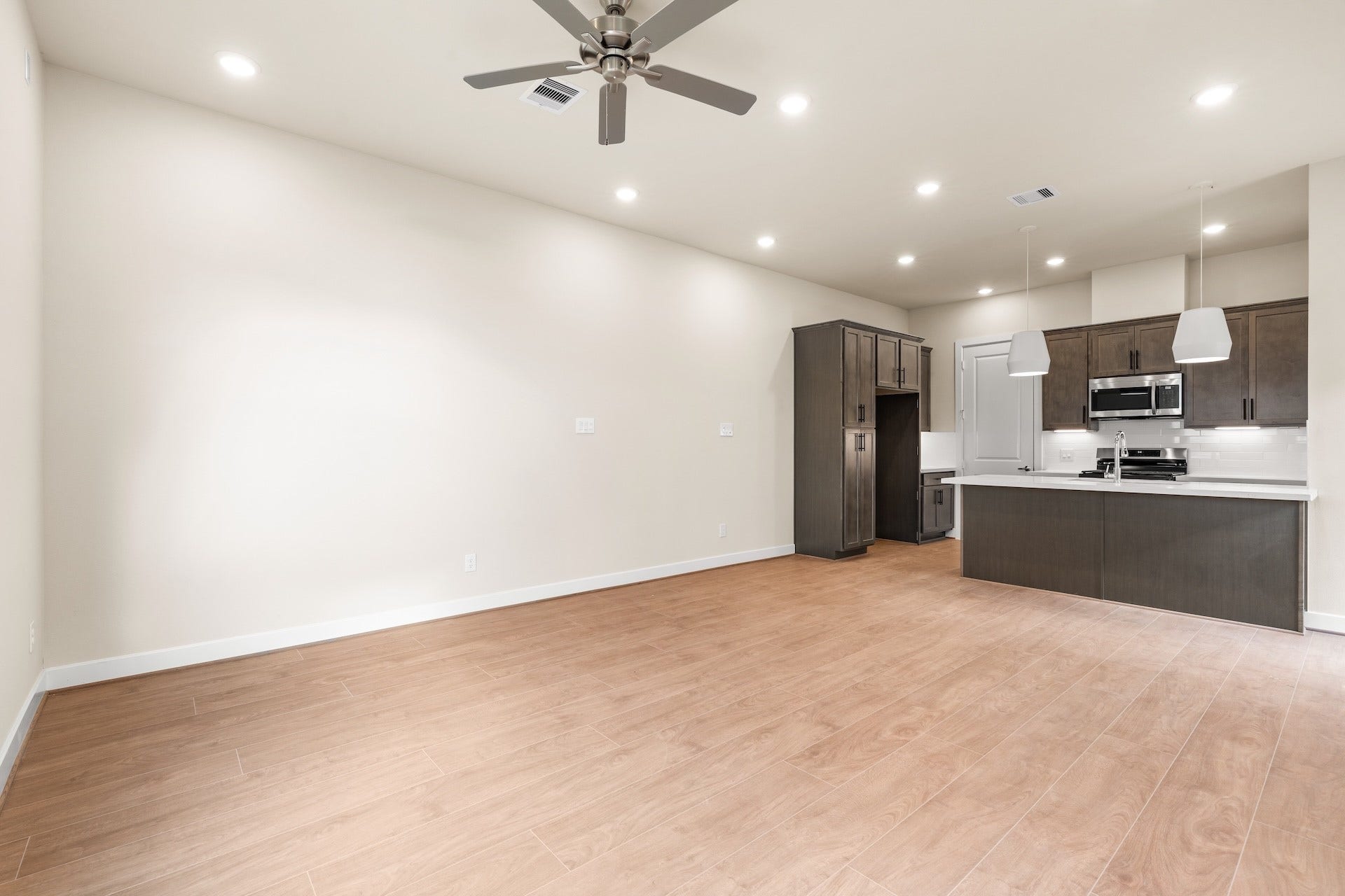 6551-6553 Rena Street, Houston, TX 77092 Living Room Previous work by the builder in the community, not representation of exact unit listed