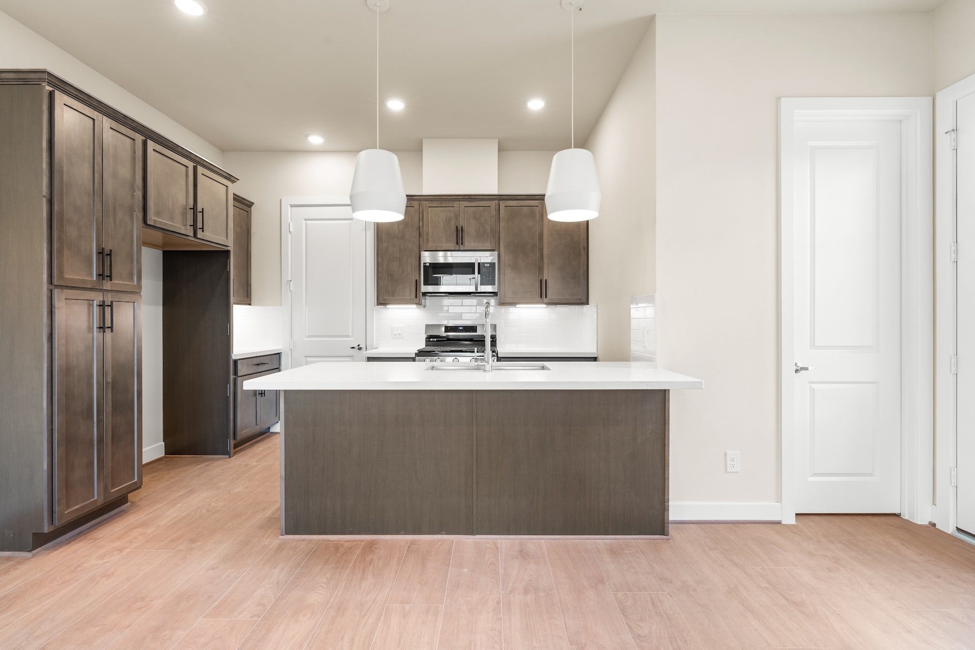 6551-6553 Rena Street, Houston, TX 77092 Kitchen Previous work by the builder in the community, not representation of exact unit listed.