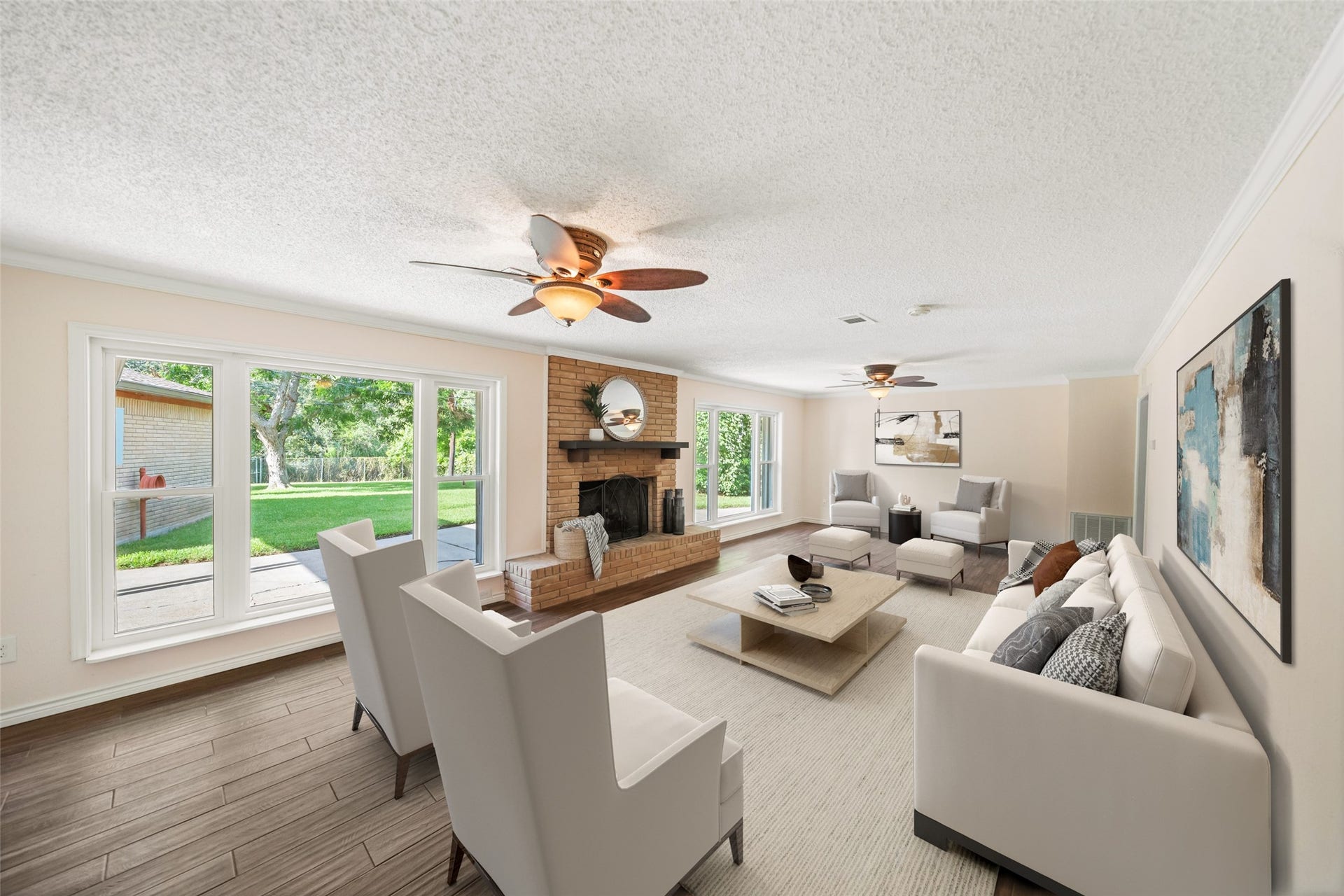7714 Pecanwood Street, Hitchcock, TX 77563 This living room is the perfect combination of indoor and outdoor living!! Spacious cozy interior, with plenty of room for entertaining and an incredible view of the yard and water!! Virtually staged.