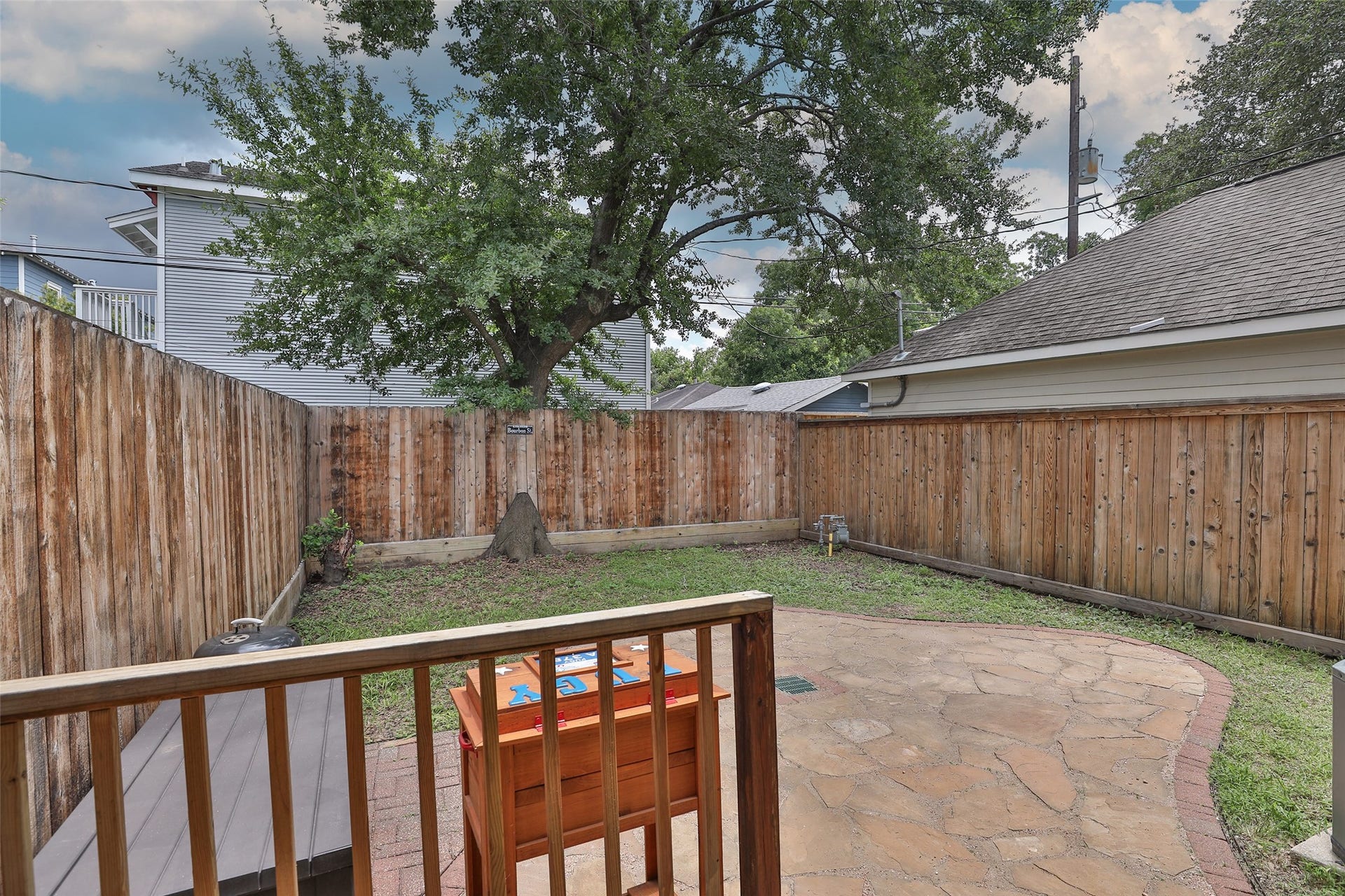Backyard with flagstone patio for family or entertaining.