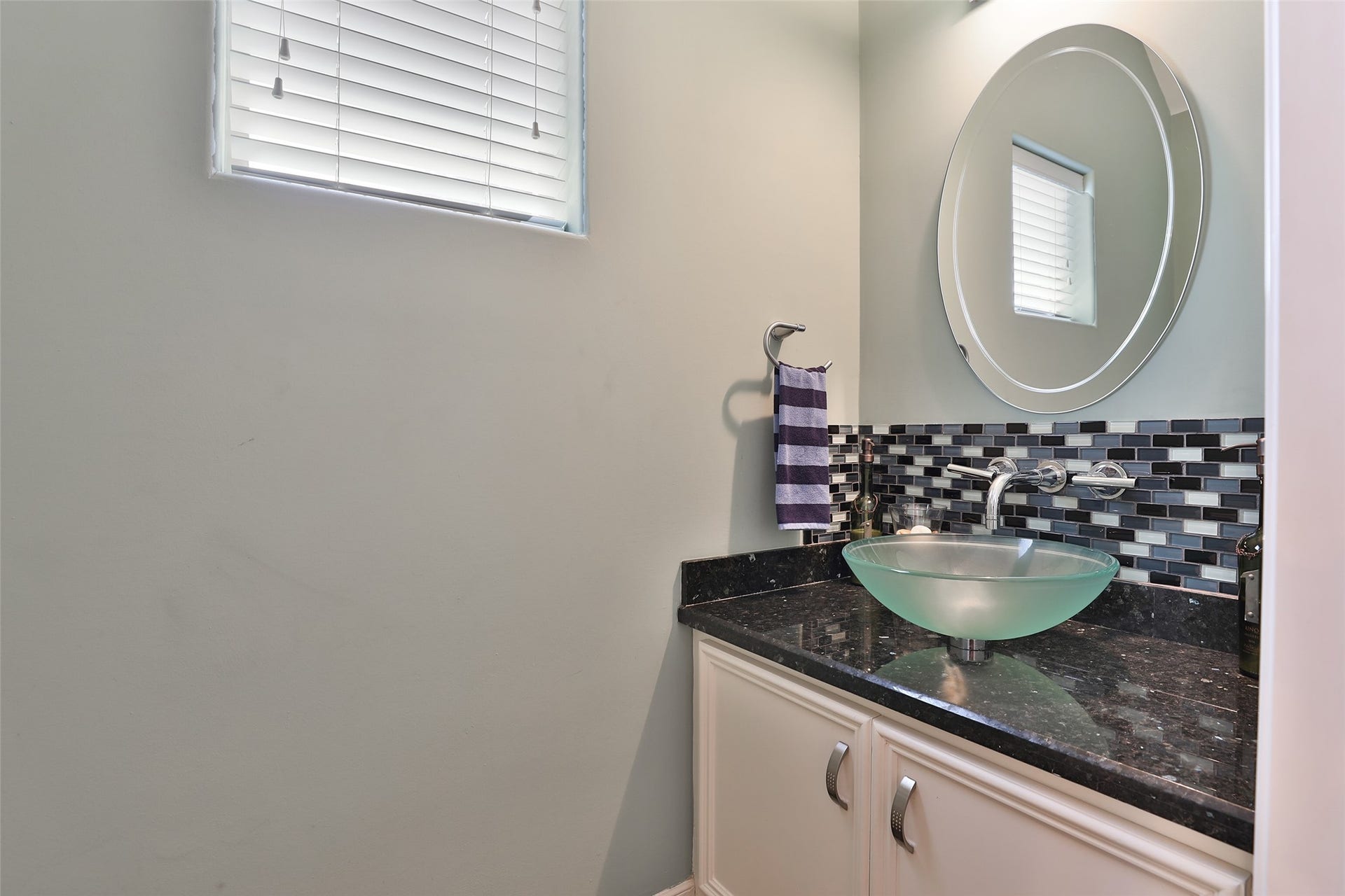 The half-bath for guests downstairs.