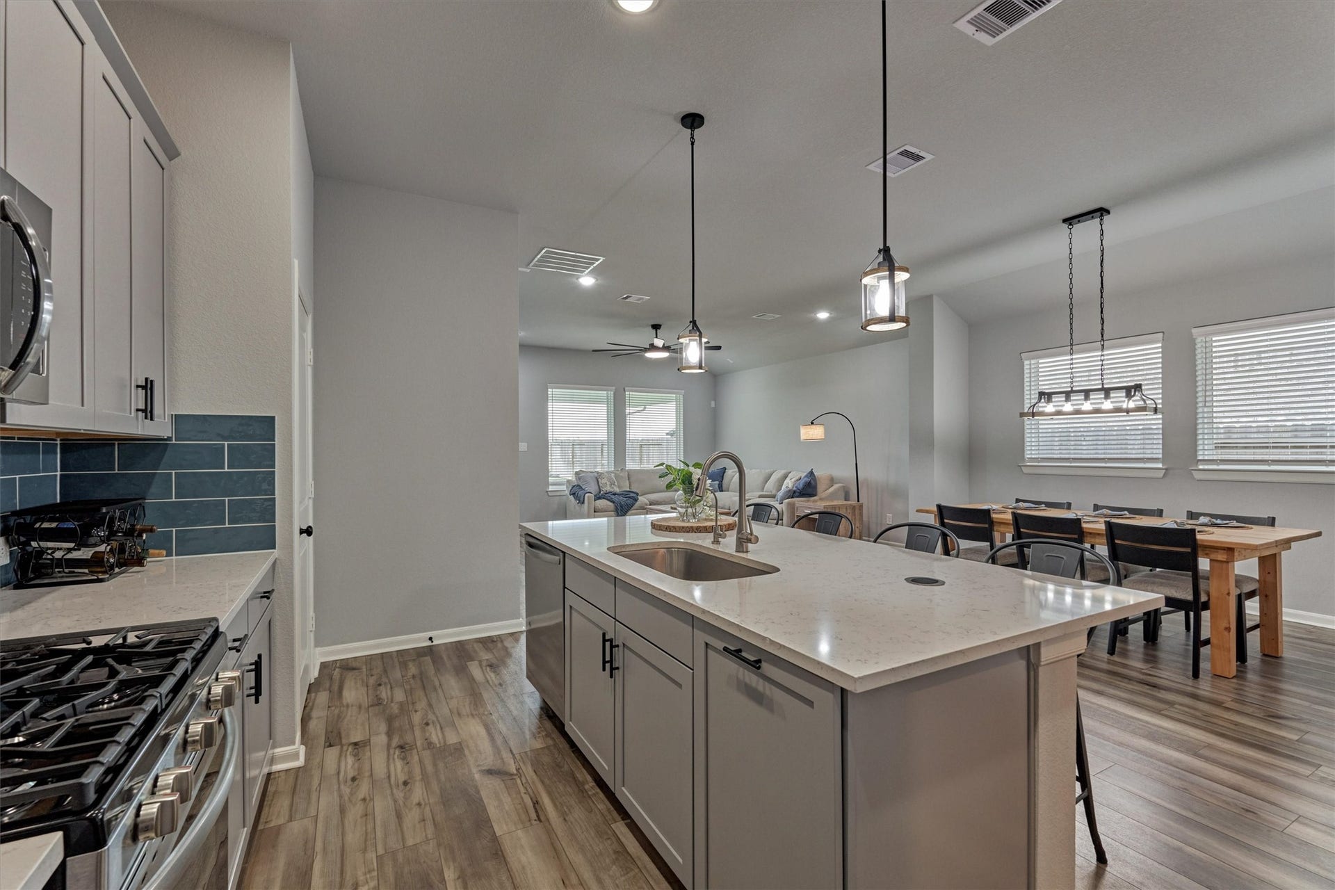 Home is complete with built-in trash drawer, gas range, and reverse osmosis/whole home water filtration system + softener!