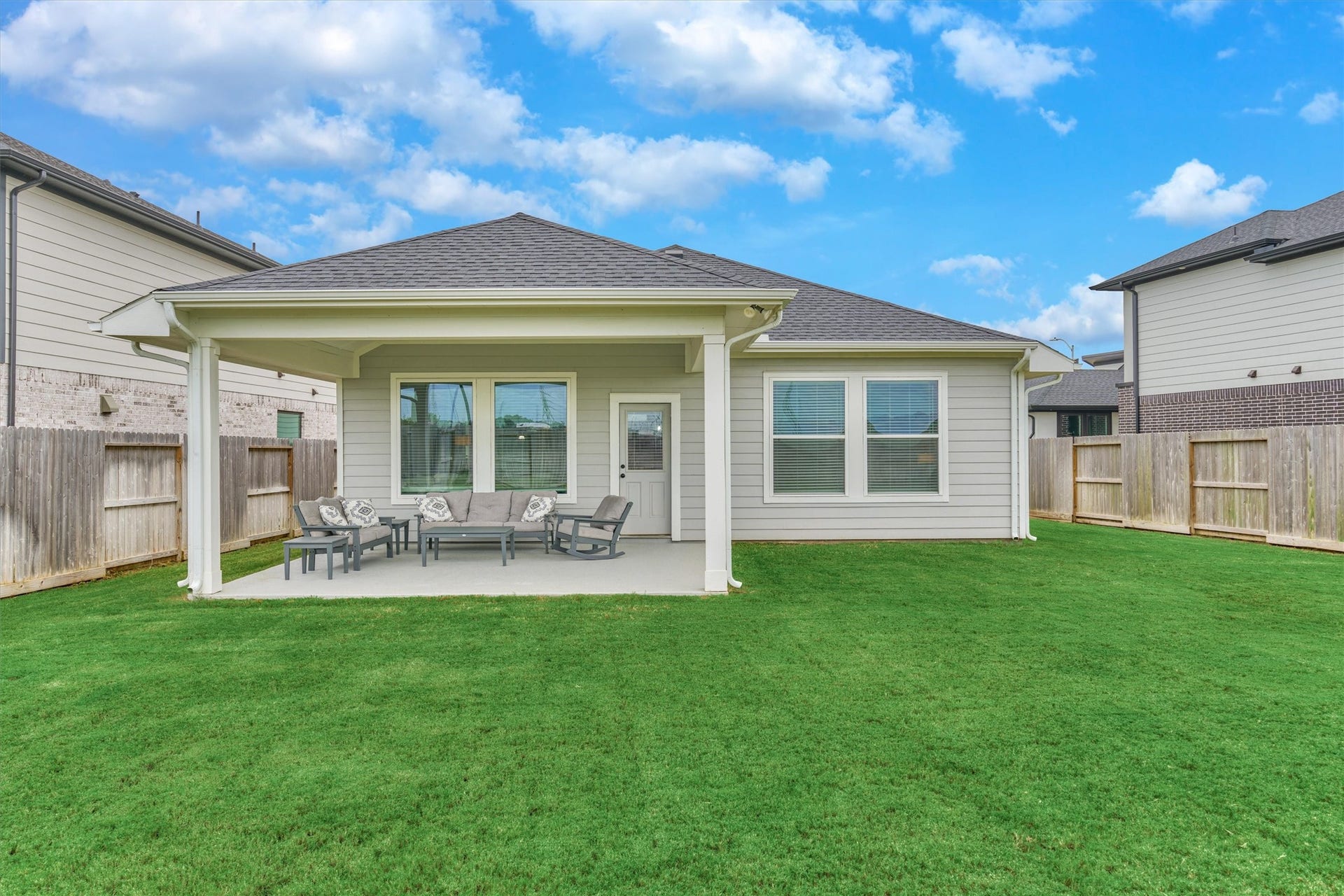 Relax each day under this extended covered patio as you watch the sunset!