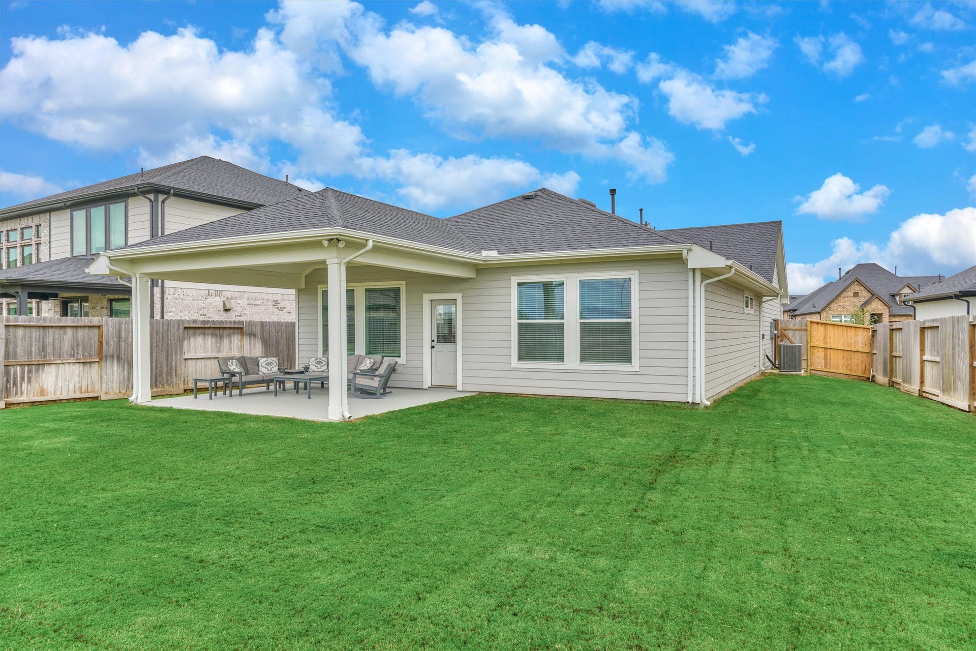 Grand side yard is unique to this impressive lot!