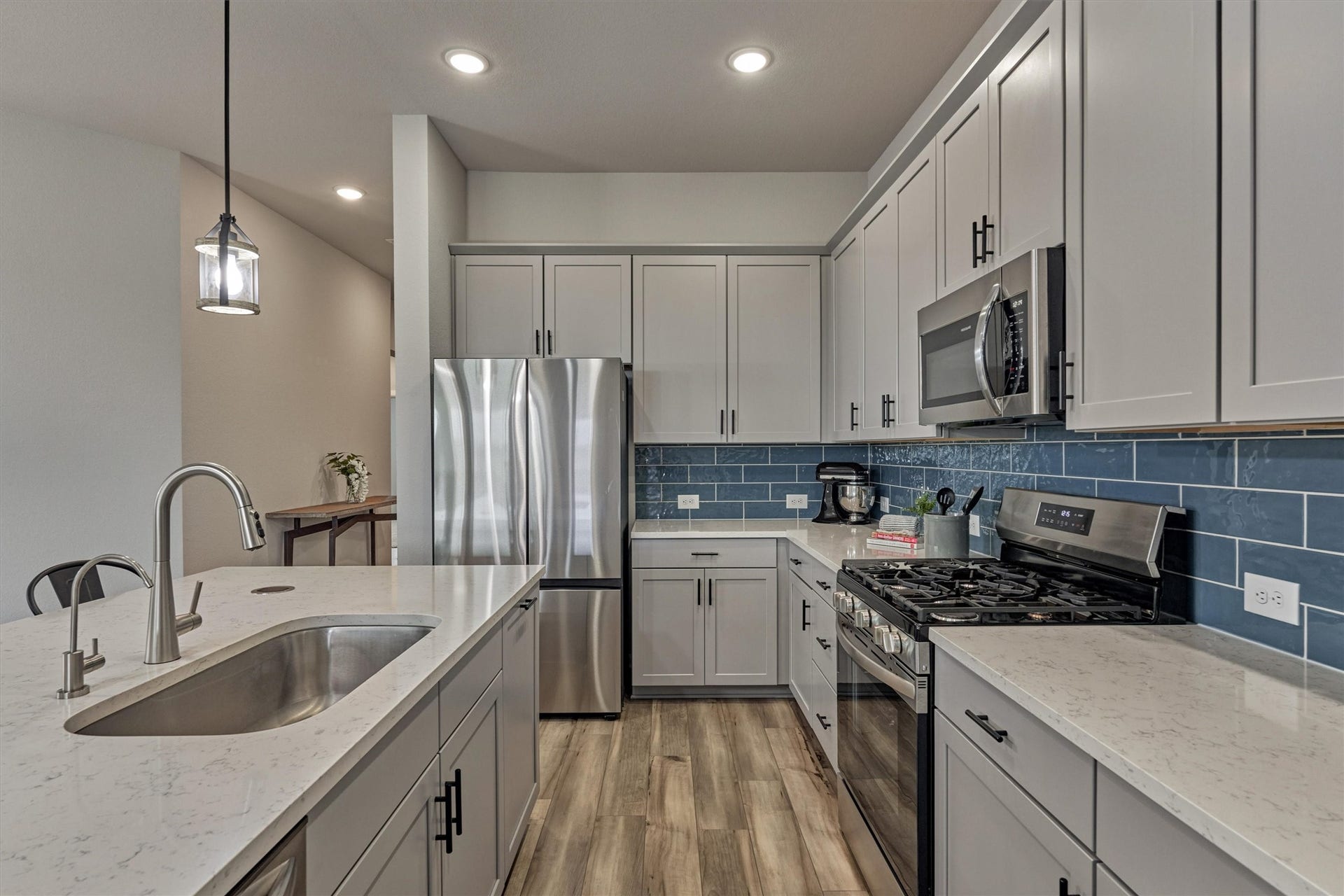 Note the complementary hardware on the cabinets for added appeal.