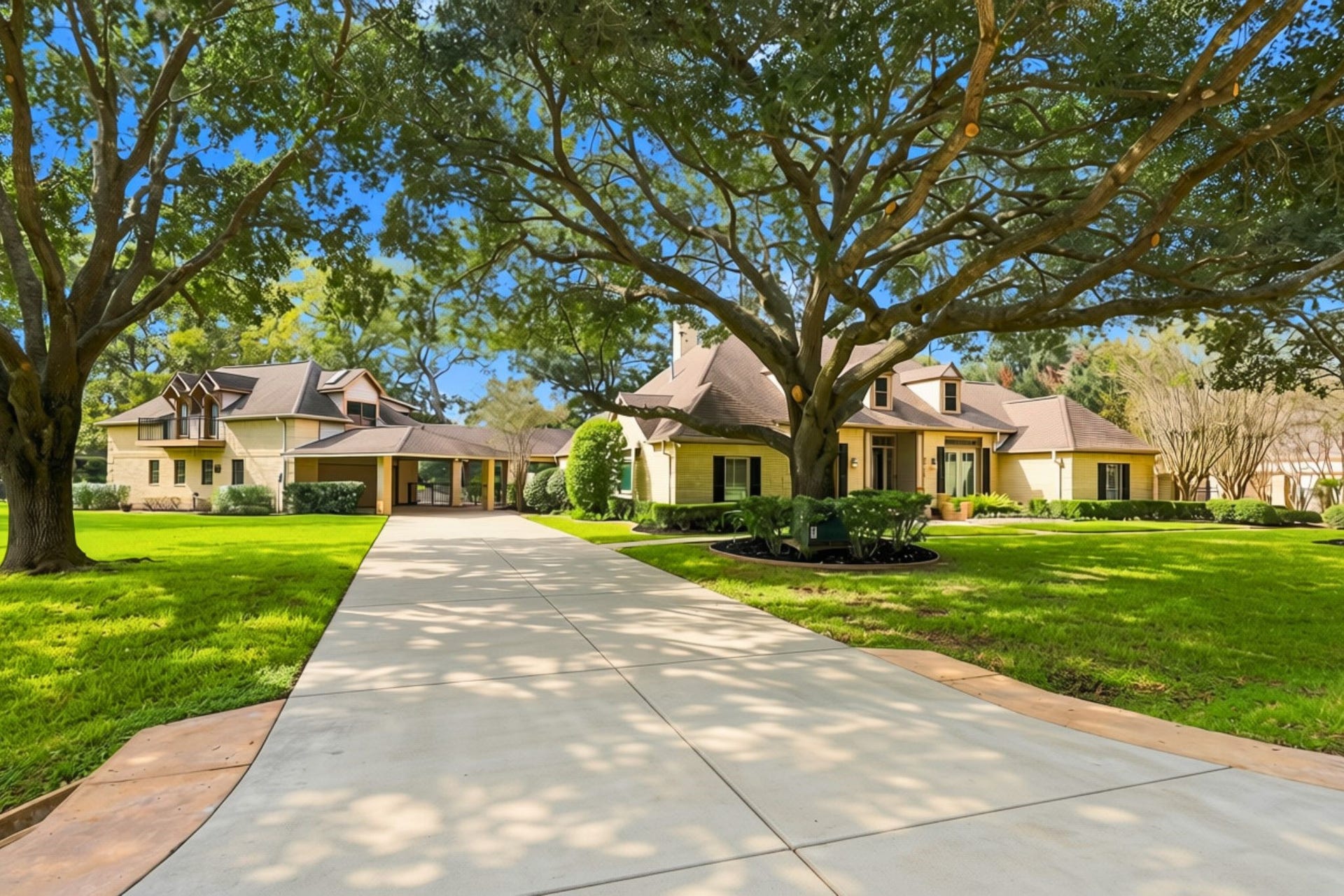 4711 Westerdale Drive, Fulshear, TX 77441 The home features a gorgeous light-brick exterior surrounded by majestic mature oak trees, creating beautiful curb appeal and a picturesque setting. Additional accommodations include a 3-Car Garage attached to the main house, plus a 2-car oversized garage, a 589-sqft. air-conditioned workshop with a half bath, and a separate garage apartment or guest quarters located on the second floor of the addition. These versatile spaces offer exceptional flexibility for guests, extended family and additional storage.