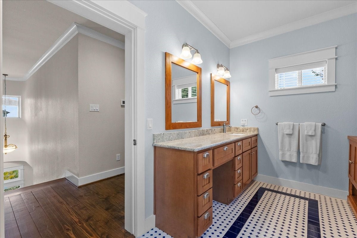 808 Elm Road, Clear Lake Shores, TX 77565 upstairs bath offers dual vanities, generous storage and lots of room.