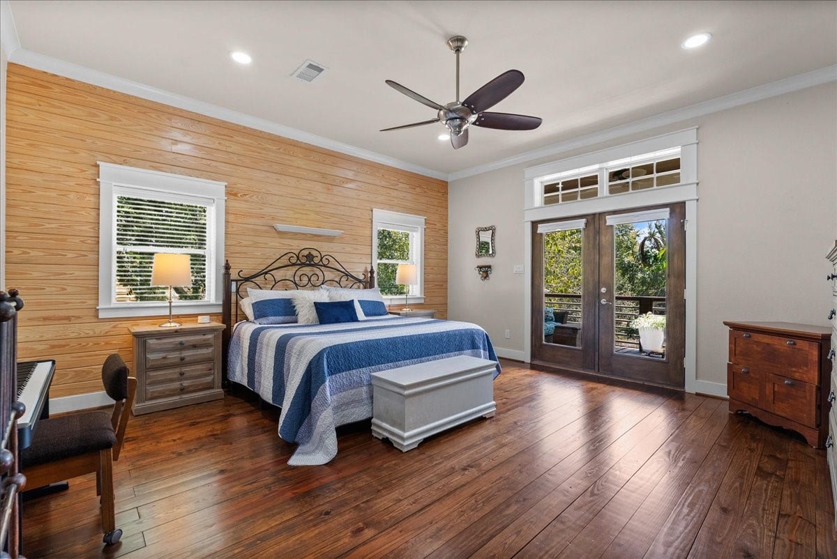 808 Elm Road, Clear Lake Shores, TX 77565 Spacious primary retreat with abundant natural light and a relaxing feel with access to the covered balcony