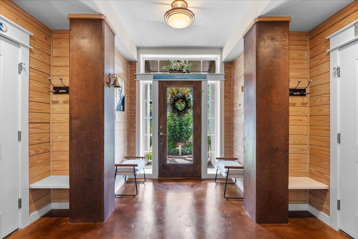 808 Elm Road, Clear Lake Shores, TX 77565 Inviting view of the entryway from the stairs
