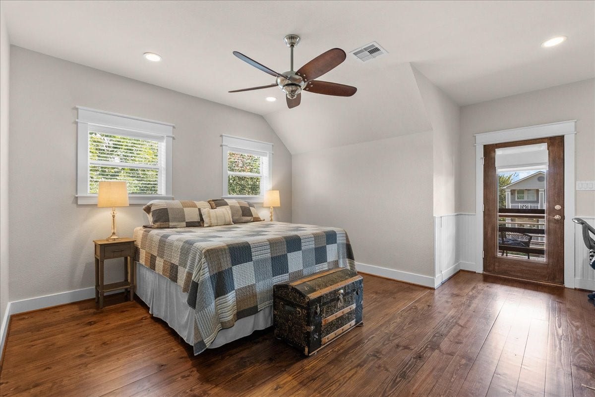 808 Elm Road, Clear Lake Shores, TX 77565 Inviting upstairs bedroom with direct access to the covered balcony, so much natural light.