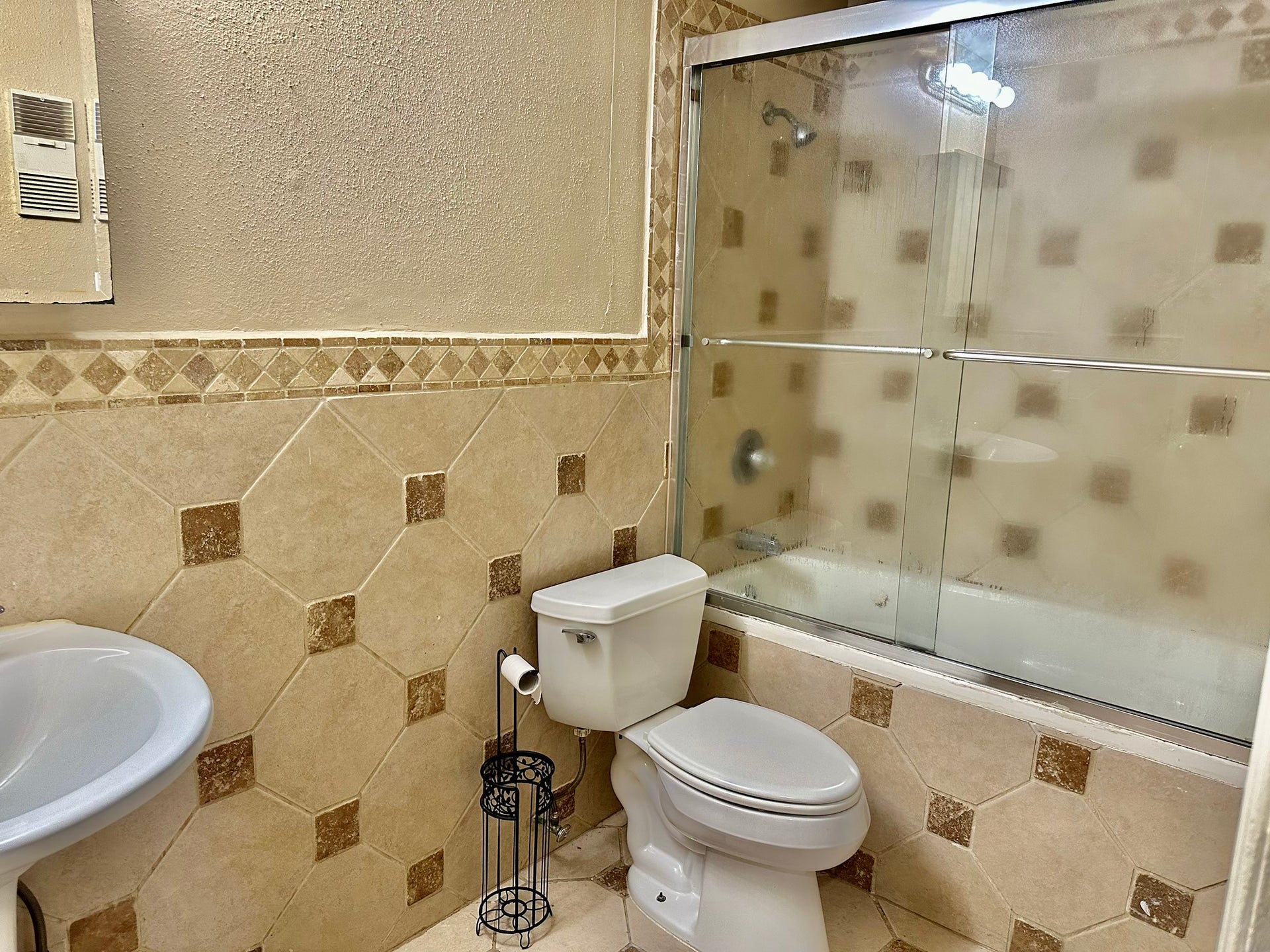2750 Holly Hall Street, #703, Houston, TX 77054 Bathroom with jetted/soaker tub and glass enclosure.