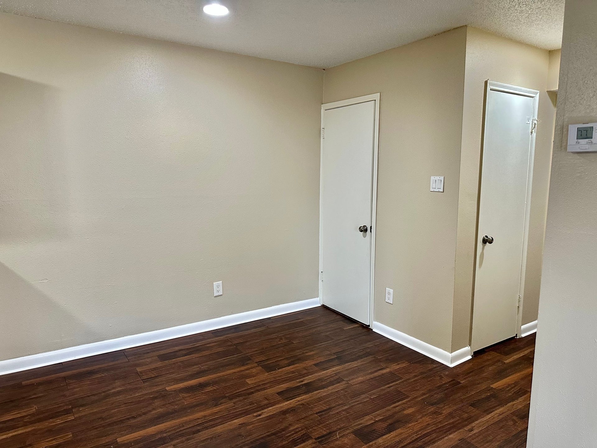 2750 Holly Hall Street, #703, Houston, TX 77054 Dining area with door on the right to the utility closet.