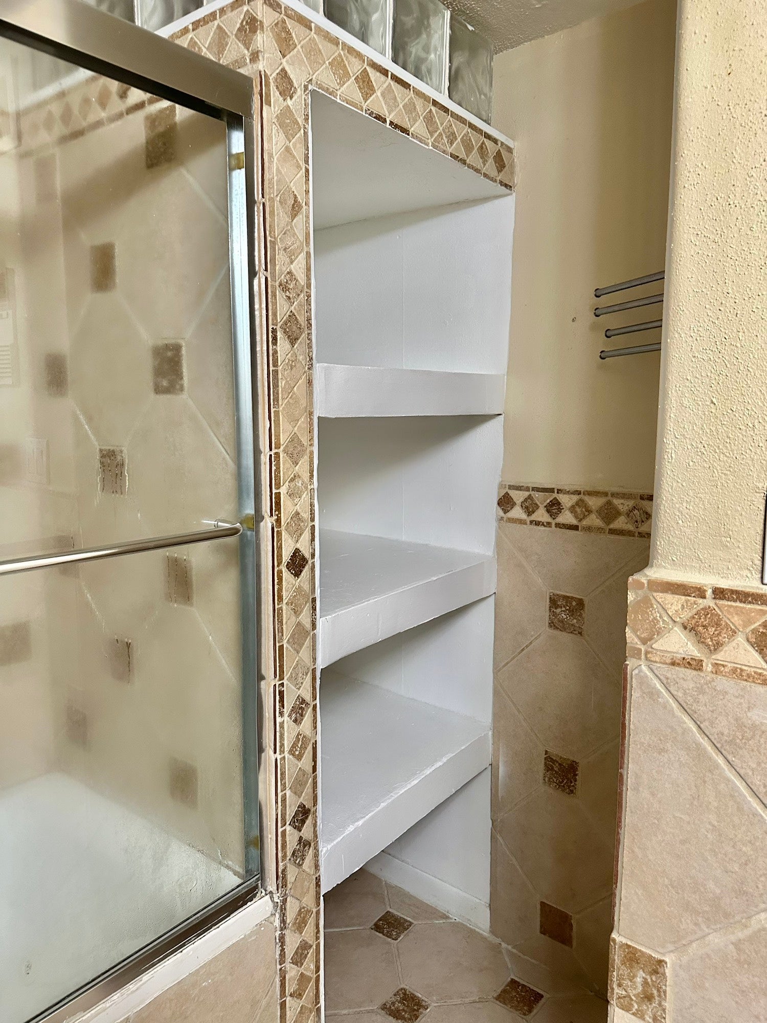 2750 Holly Hall Street, #703, Houston, TX 77054 Bath showing shelving for linen.
