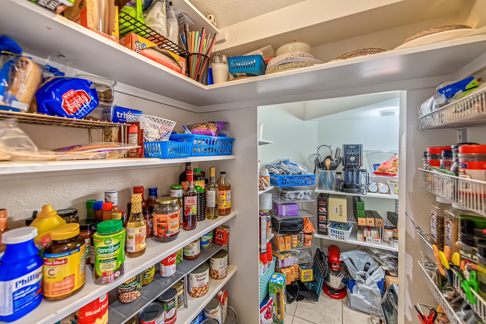 21223 Dover Park Lane, Katy, TX 77450 Spacious walk-in pantry with ample shelving and storage space for all your kitchen essentials.