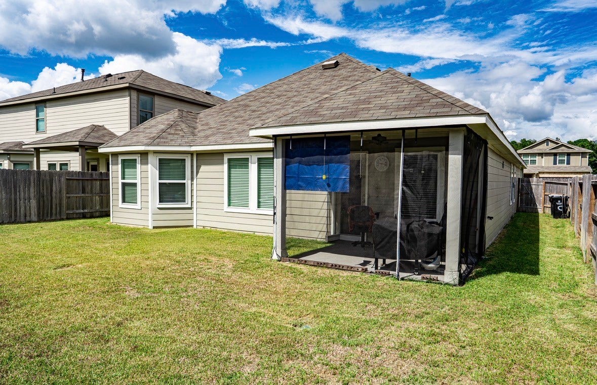 22126 Oakland Meadows Lane, New Caney, TX 77357 Backyard with covered patio