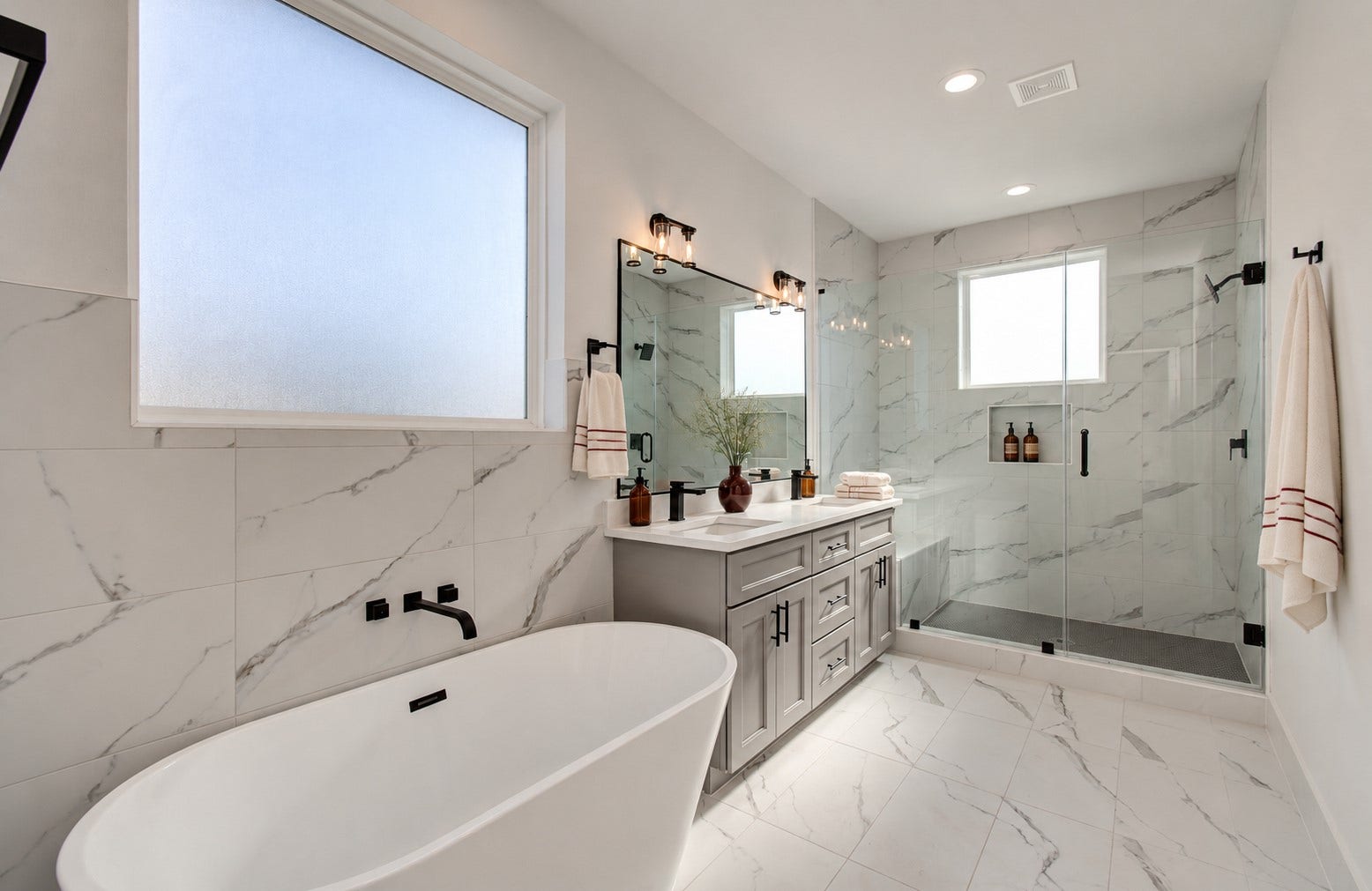 4425 Providence Street, Houston, TX 77020 Set beneath a frosted window, the freestanding tub gives you a place for a long soak, while the separate shower keeps busy mornings just as easy. Virtually staged.