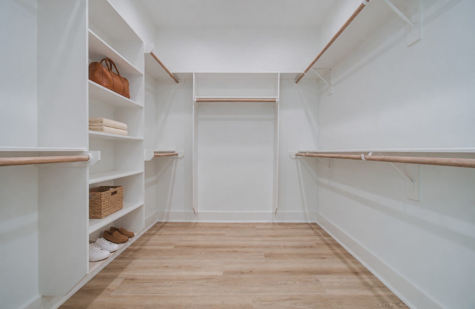 4425 Providence Street, Houston, TX 77020 The oversized walk-in closet offers extensive hanging space and built-in shelving, giving your wardrobe room to spread out and making it easier to keep everything organized. Virtually staged.
