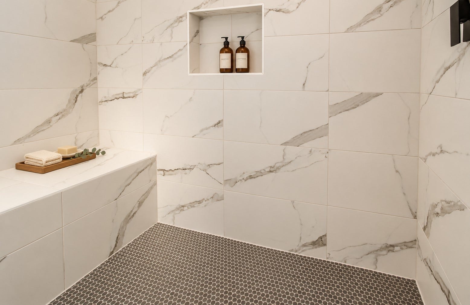 4425 Providence Street, Houston, TX 77020 A built-in bench and recessed toiletry niche add everyday comfort to the primary suites spacious separate shower.