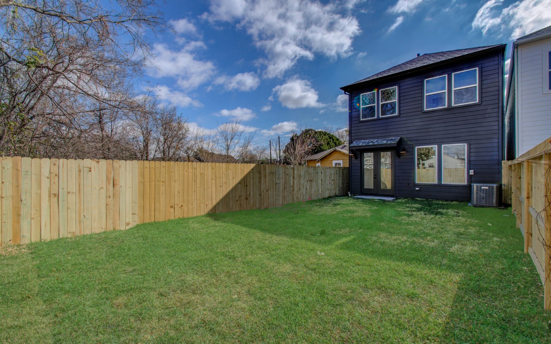 4425 Providence Street, Houston, TX 77020 French doors connect the first-floor living area directly to the backyard, making it easy to take dinner outside or open up the house when the weather is too good to stay in.
