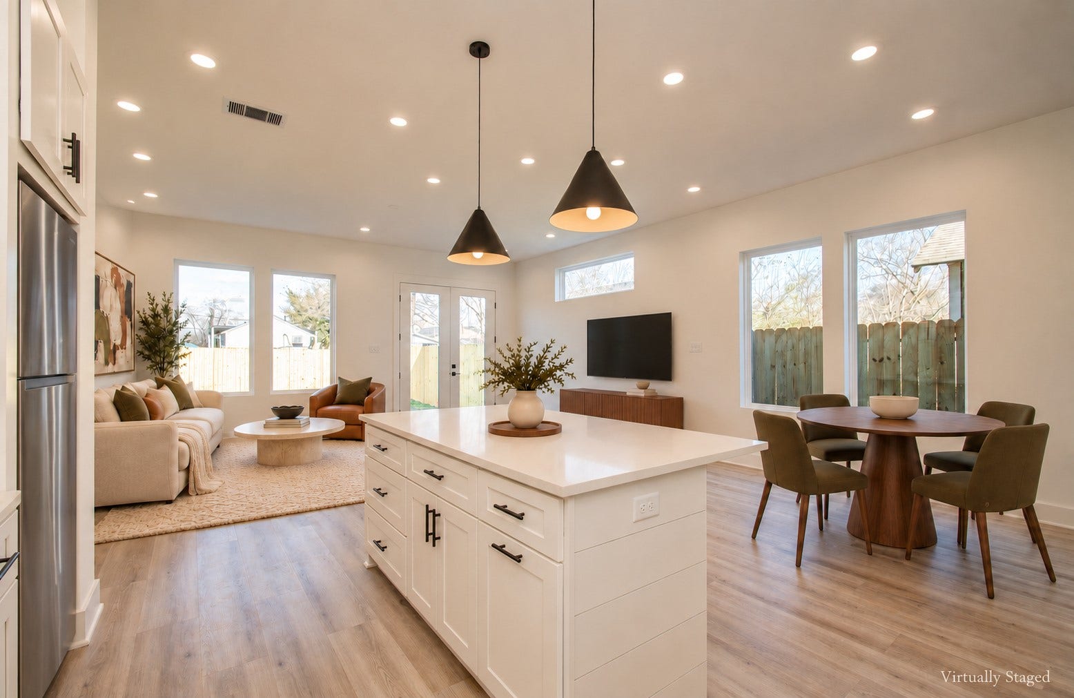 4425 Providence Street, Houston, TX 77020 From the island, you can stay connected to the dining area, living room and backyard, so preparing dinner doesnt mean disappearing from the evening. Virtually staged.