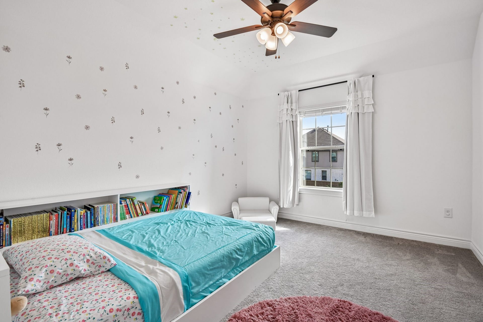 24110 Hawthorn Breeze Way, Katy, TX 77493 Secondary bedroom with ceiling fan, closet, and natural light