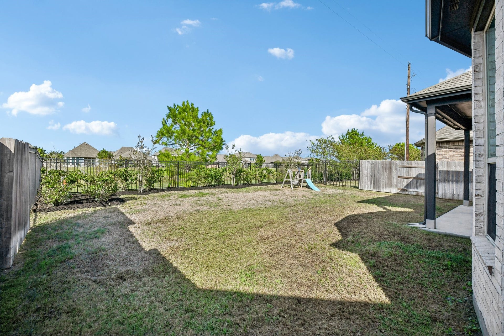 24110 Hawthorn Breeze Way, Katy, TX 77493 Large fenced backyard with open lawn and room for future outdoor improvements