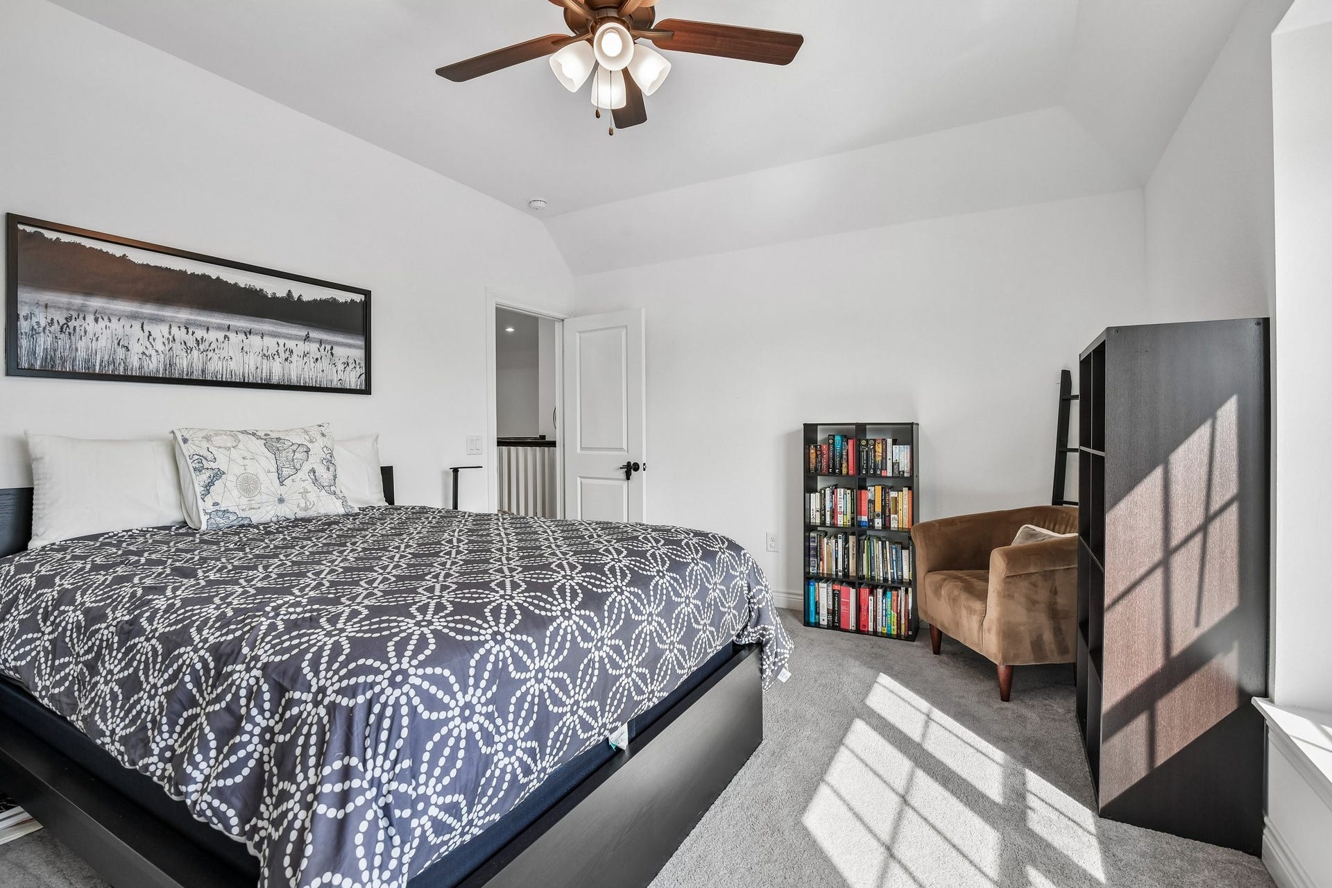 24110 Hawthorn Breeze Way, Katy, TX 77493 Additional upstairs bedroom with neutral finishes, ceiling fan, and closet