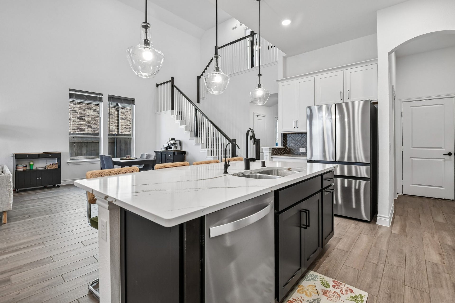 24110 Hawthorn Breeze Way, Katy, TX 77493 Opposite kitchen angle showing extensive cabinetry, prep space, and access to the pantry and wet bar