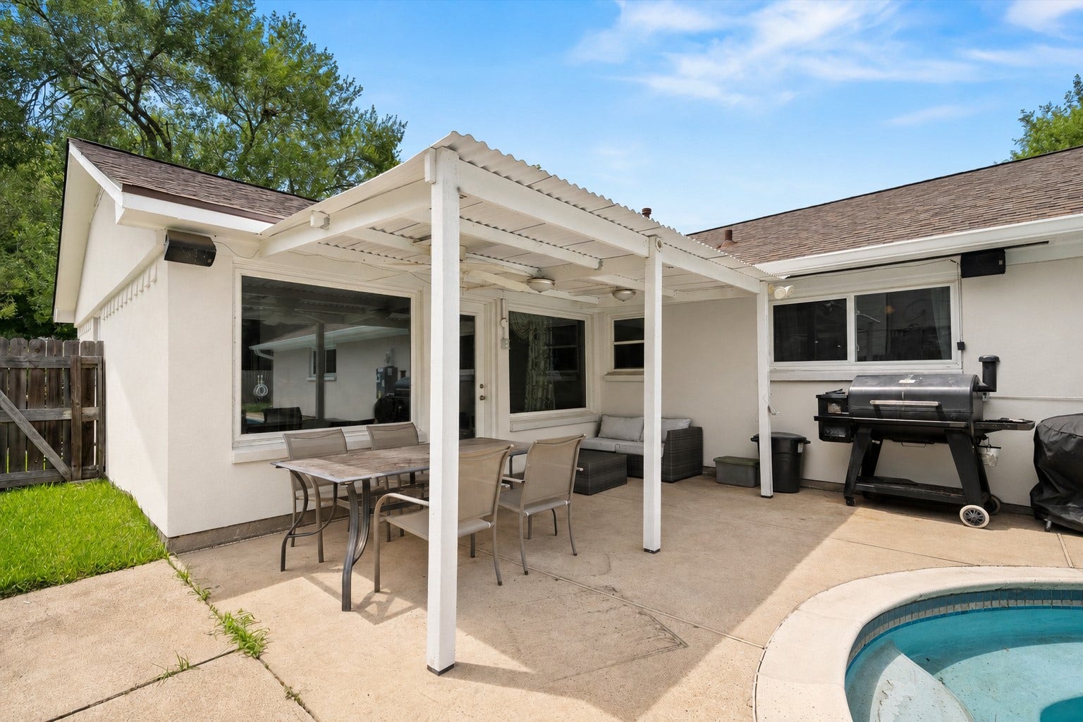 2309 Halbert Drive, Pearland, TX 77581 A closer look of the spacious covered patio, creating the perfect setting for outdoor entertaining, relaxing evenings, and everyday enjoyment. *Virtually staged