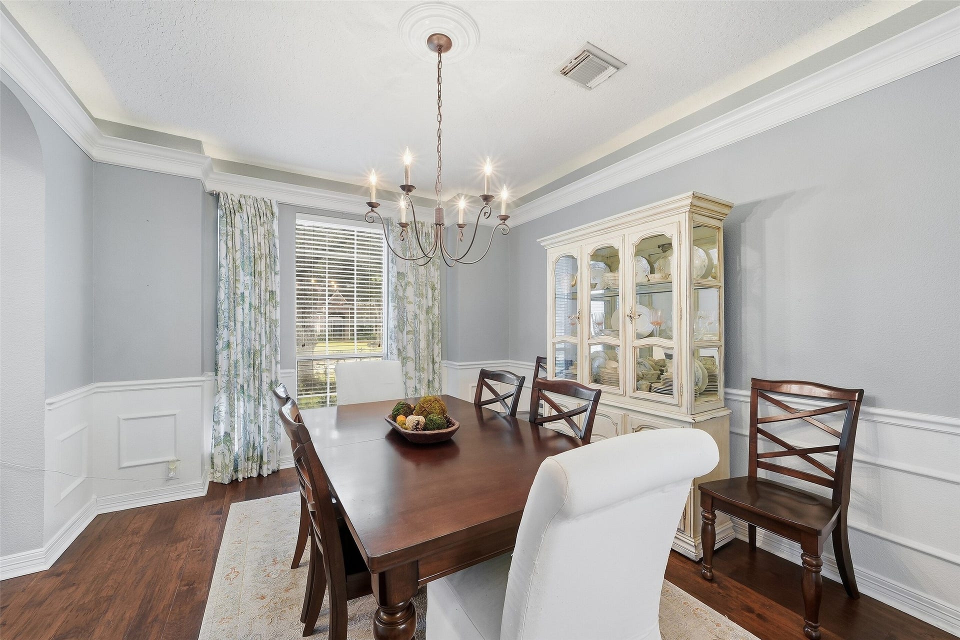 22514 Sierra Lake Court, Katy, TX 77494 This Gorgeous Formal Dining Room Boasts A Lighted Tray Ceiling, Custom Crown Moulding & Upgraded Wainscoting adding a Beautiful Flare!