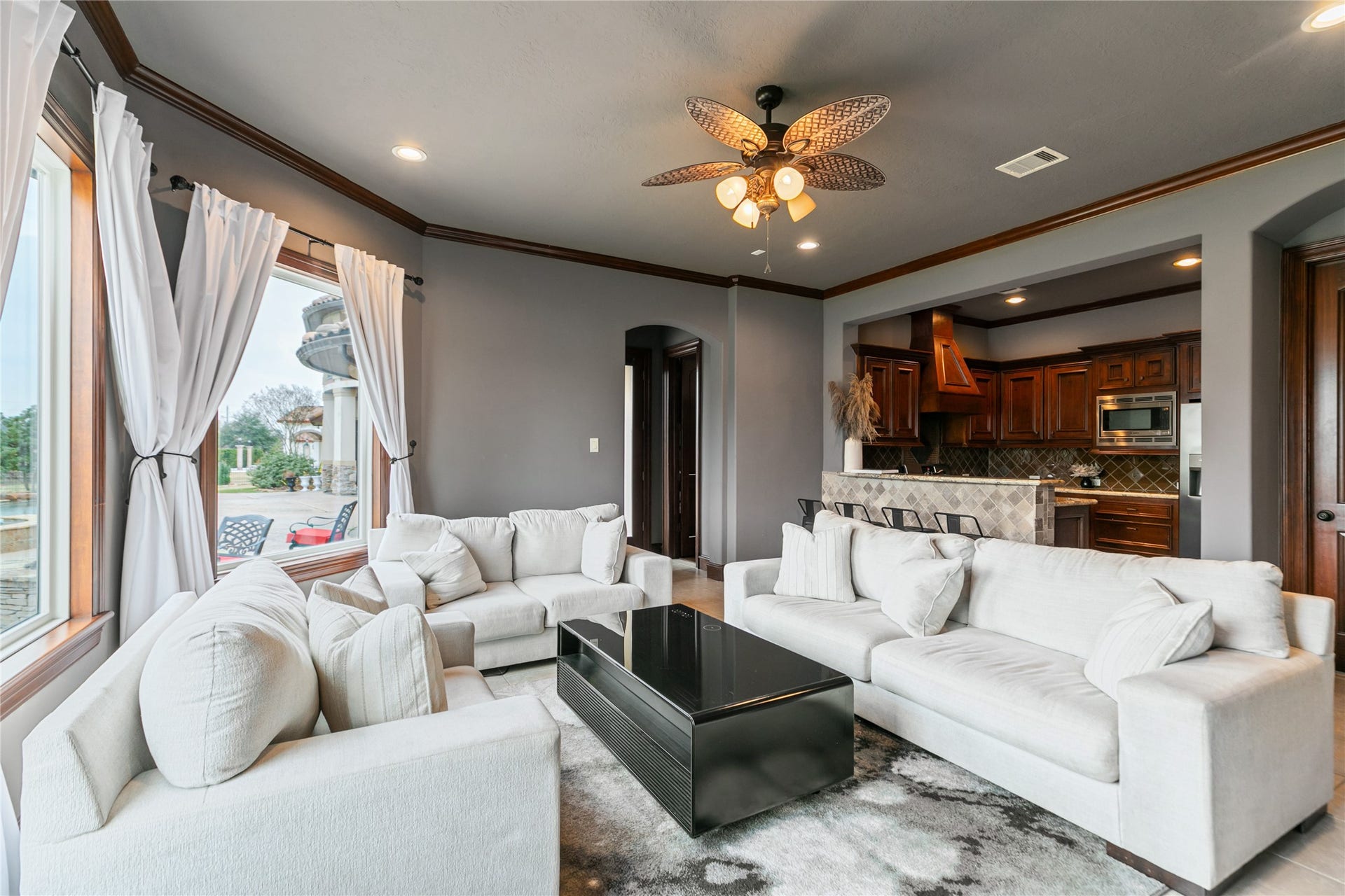 Attached apartment space with full kitchen is perfect space for guests, multigenerational living or dedicated executive suite.