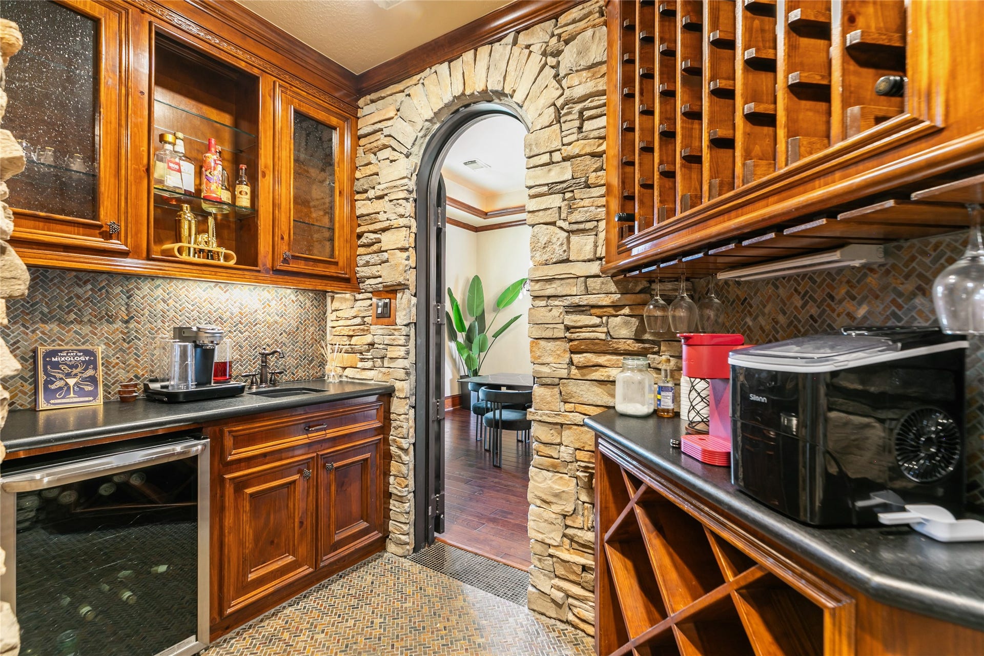 Phenomenal bar area with gorgeous accents and plenty of storage space.