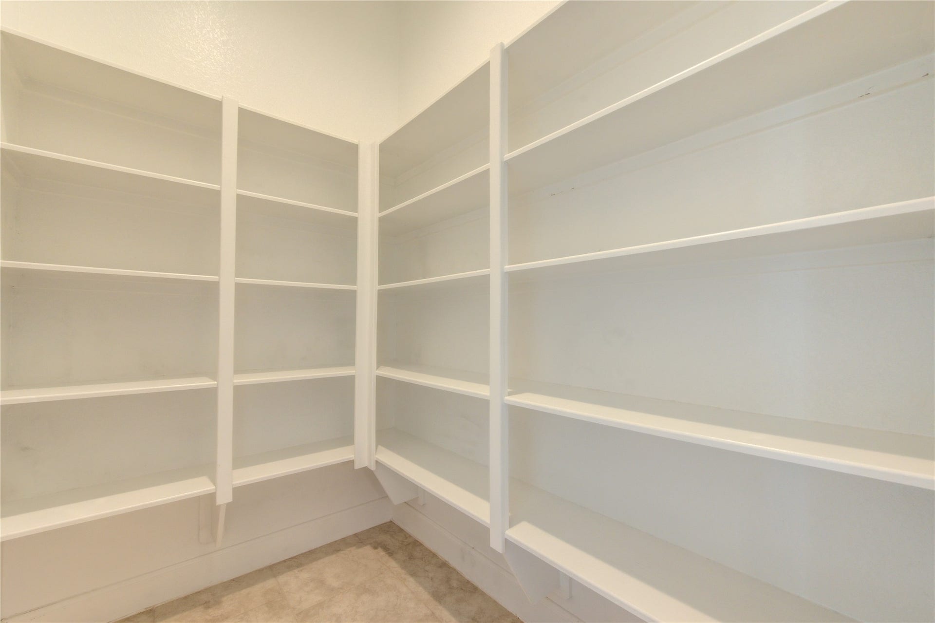 2334 Green Kale Drive, Richmond, TX 77406 Spacious walk-in pantry with ample shelving for organized food storage.