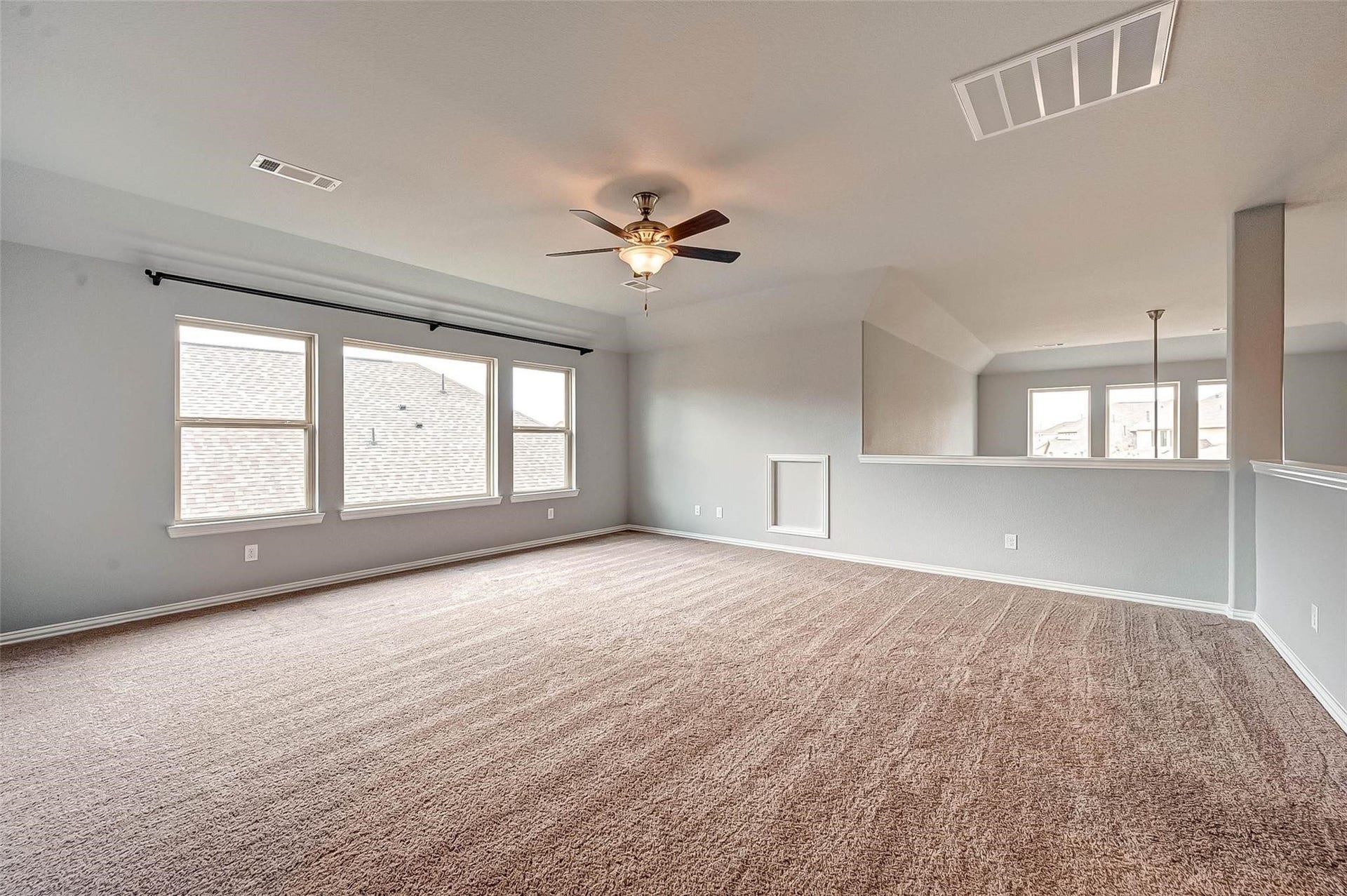 23514 San Ricci Court, Richmond, TX 77406 Spacious upstairs game room offering plenty of room for entertaining or additional living space.