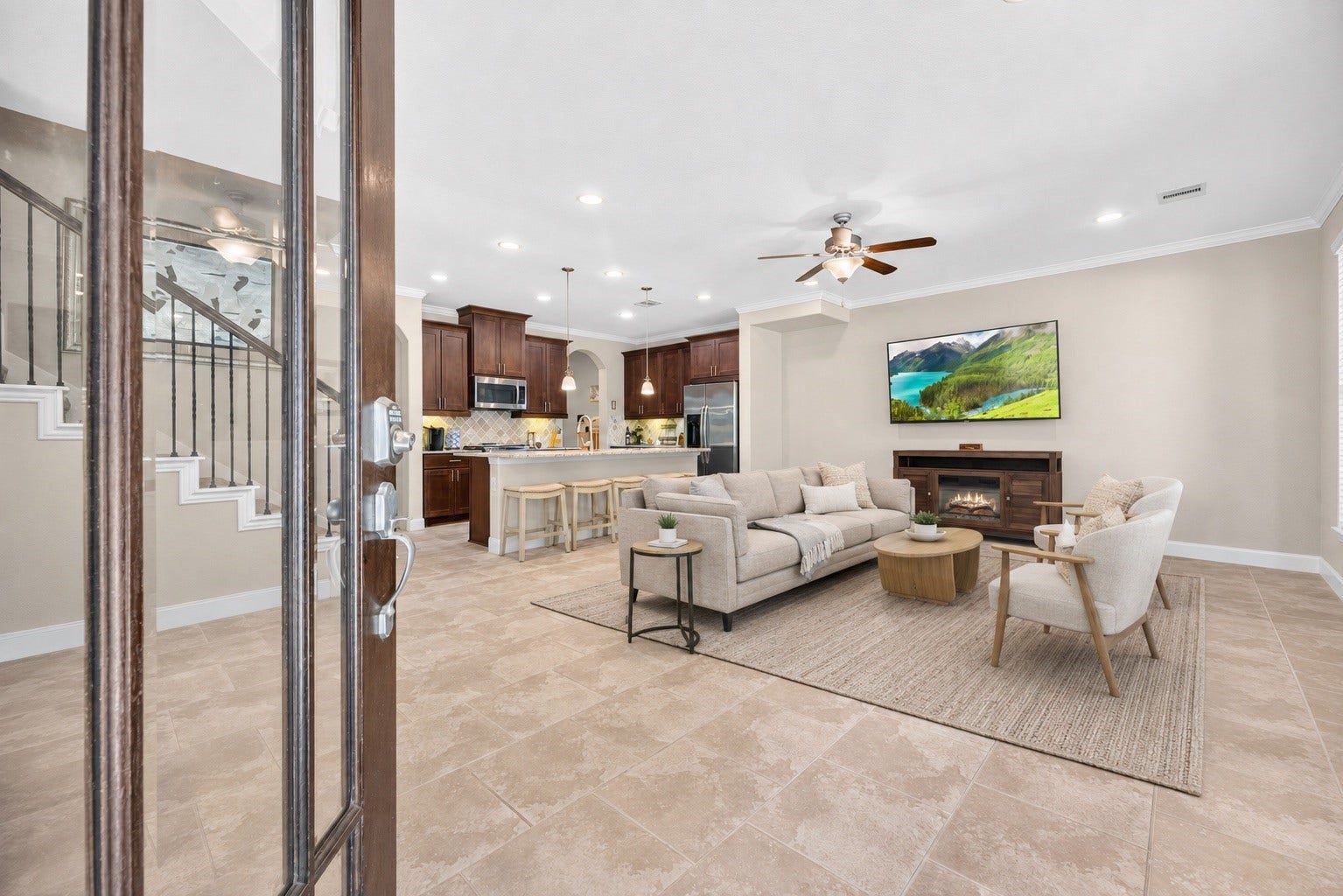 *virtually staged* Open concept first floor living with a ton of natural light.