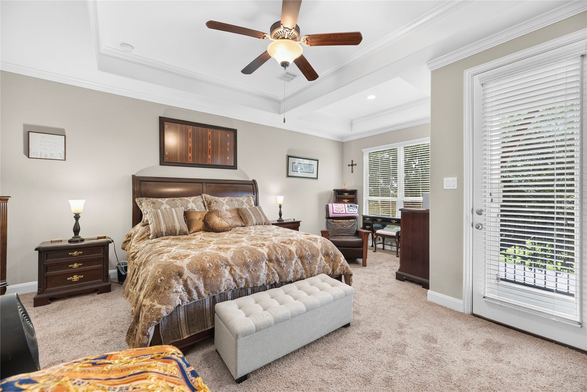 Welcome to your primary suite retreat! Spacious with your own private balcony and room for a sitting area.