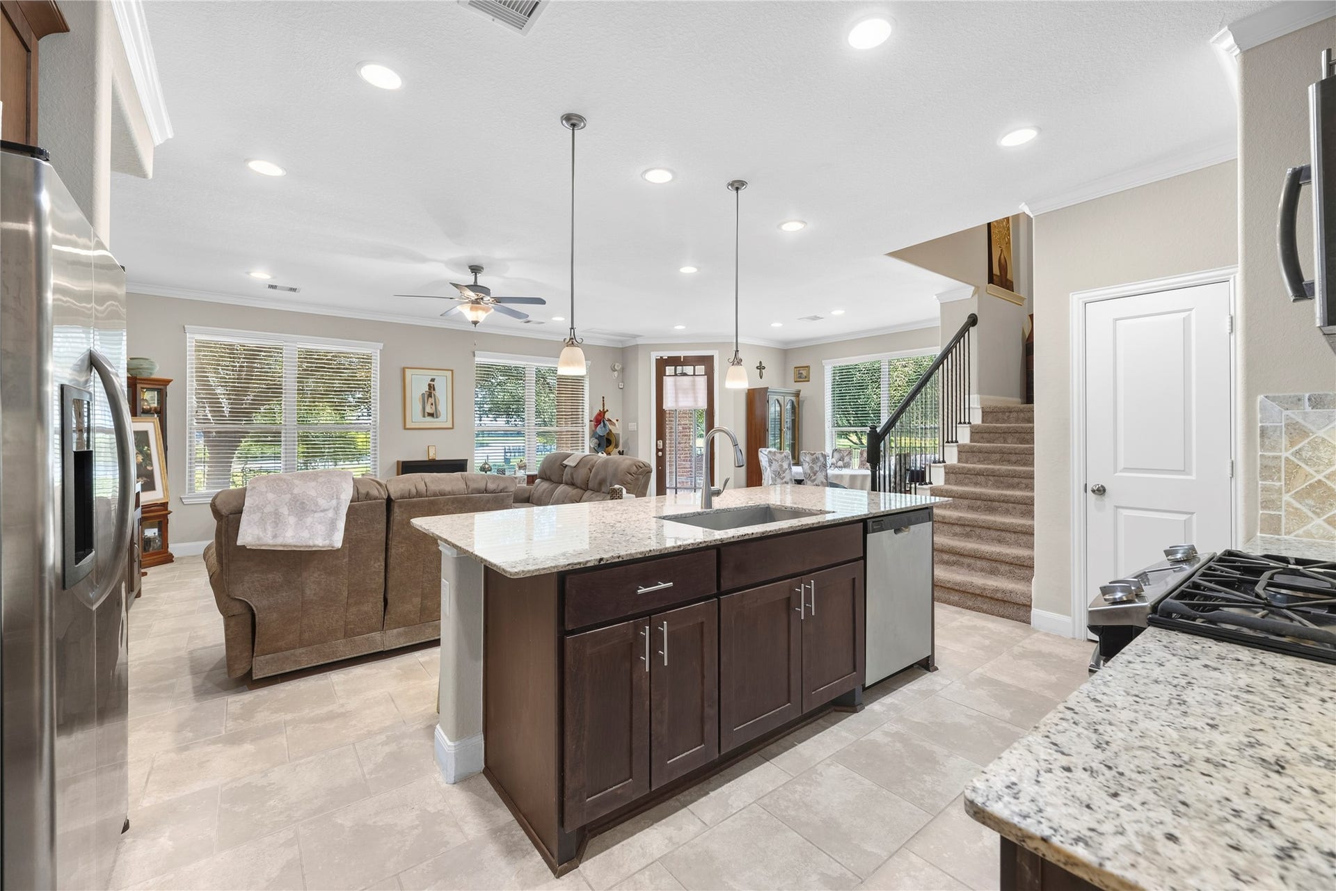Wonderfully equipped kitchen with an abundance of countertop space and cabinetry, recessed lighting, stainless steel appliances and more.