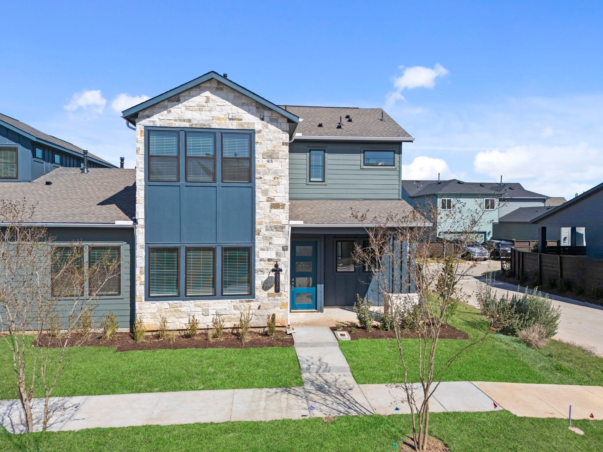 3317 City Heart Avenue, Richmond, TX 77406 The stunning exterior makes a lasting first impression, blending modern design with beautiful landscaping, clean lines, and warm architectural details.