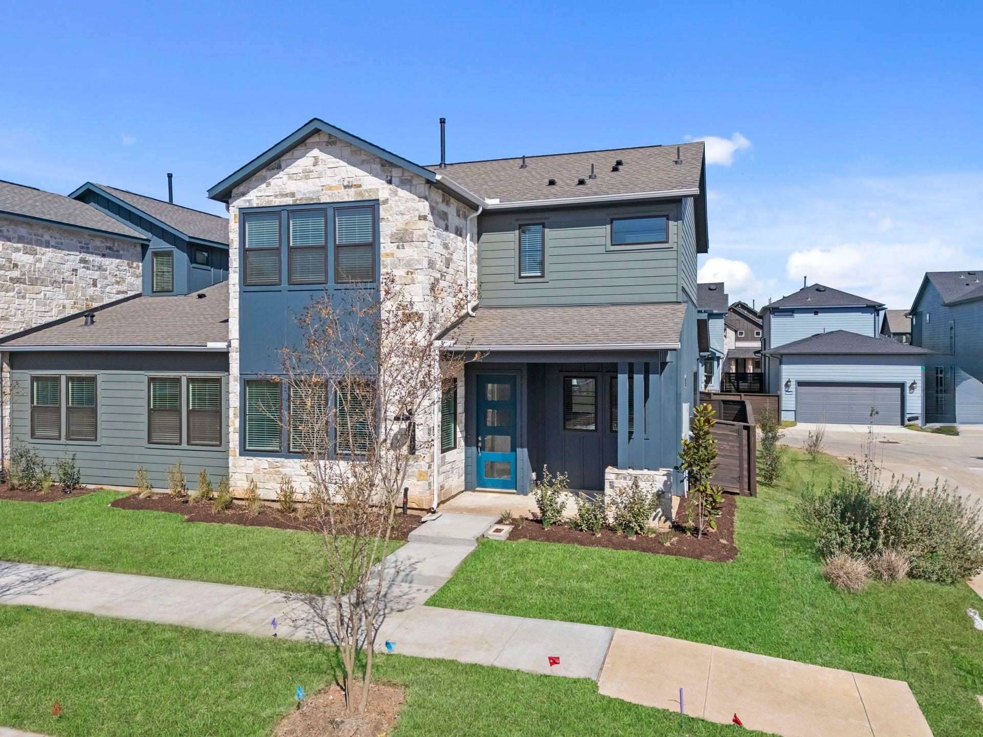 3317 City Heart Avenue, Richmond, TX 77406 Feel proud to call this modern home yours, nestled in the thoughtfully designed Indigo master-planned community. With its inviting curb appeal, beautifully landscaped yard, and distinctive stone and siding exterior, this home welcomes you with a fresh, stylish feel from the moment you arrive.