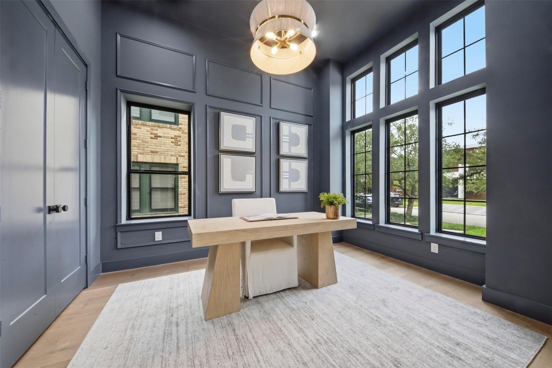 First floor office with 12 foot ceilings, large closet ,custom millwork and extensive window with fill the room with light and views of the beautiful treelined street