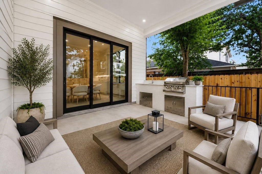 Outdoor patio off the breakfast room with built in outdoor kitchen and sink