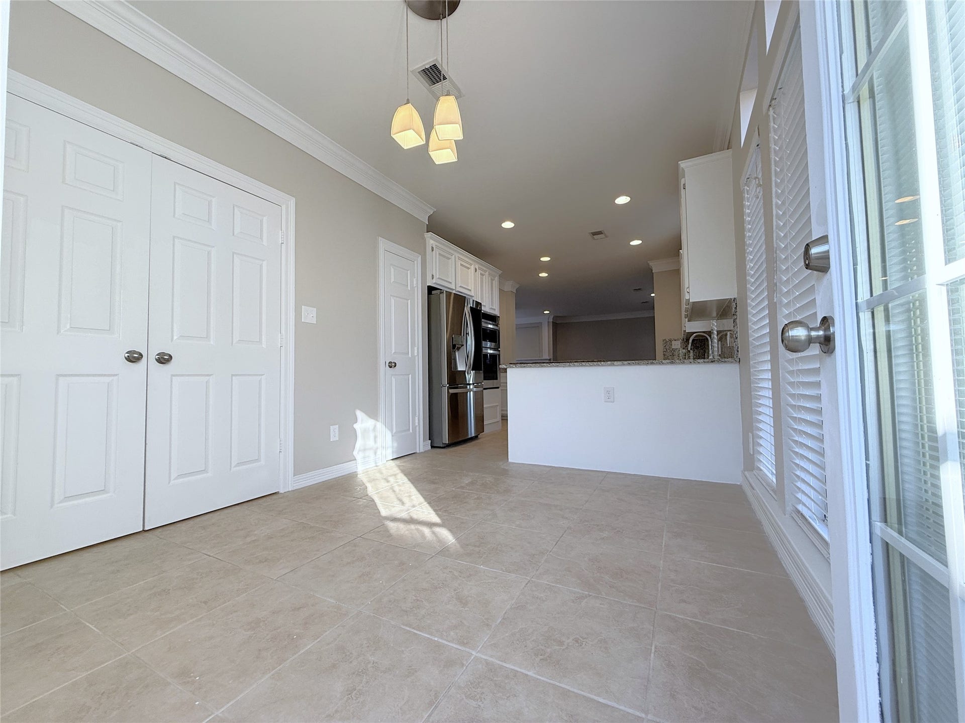 1963 Peden Street, Houston, TX 77019 Double doors open out from the laundry closet. Washer/Dryer included! Behind the door next to the refrigerator is the pantry.
