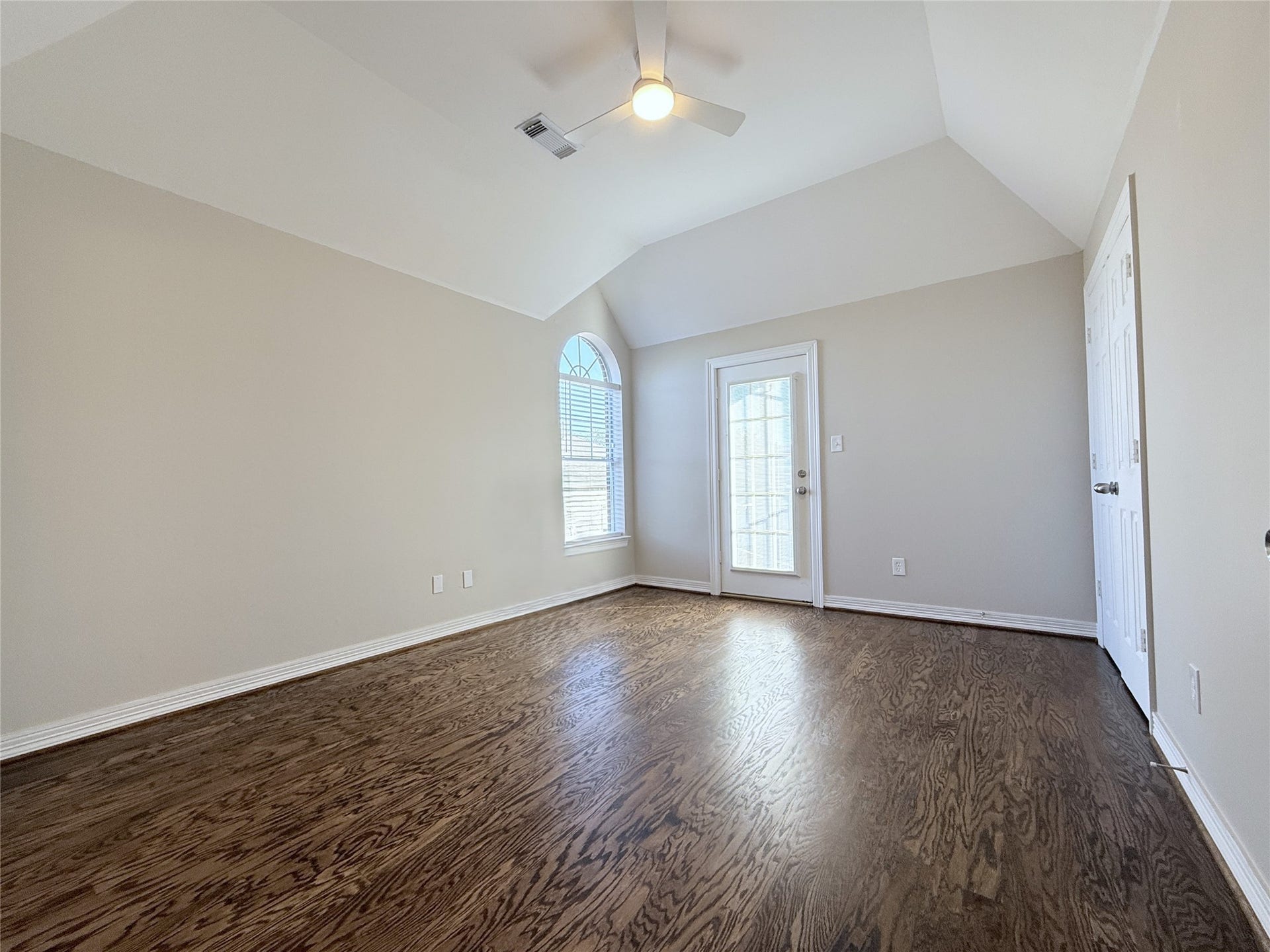 1963 Peden Street, Houston, TX 77019 The 3rd floor secondary bedroom offers a high ceiling & remote controlled ceiling fan/light. Beyond the glass paned door is the spiral stairway leading to the back yard.