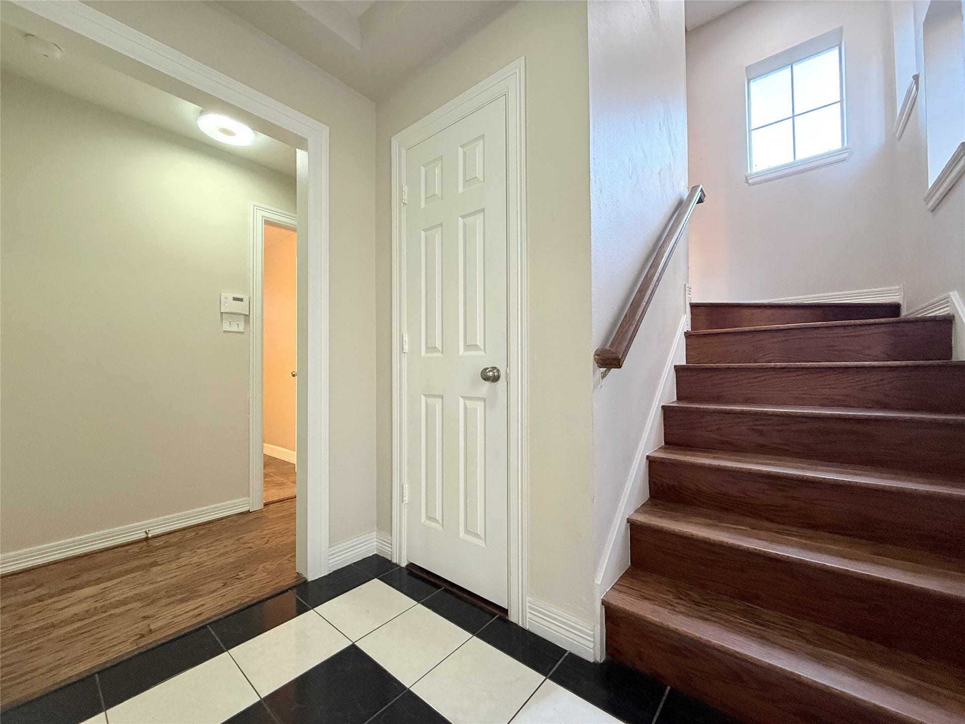 1963 Peden Street, Houston, TX 77019 Past the foyer is a short hallway leading to the 1st floor bath and secondary bedroom.